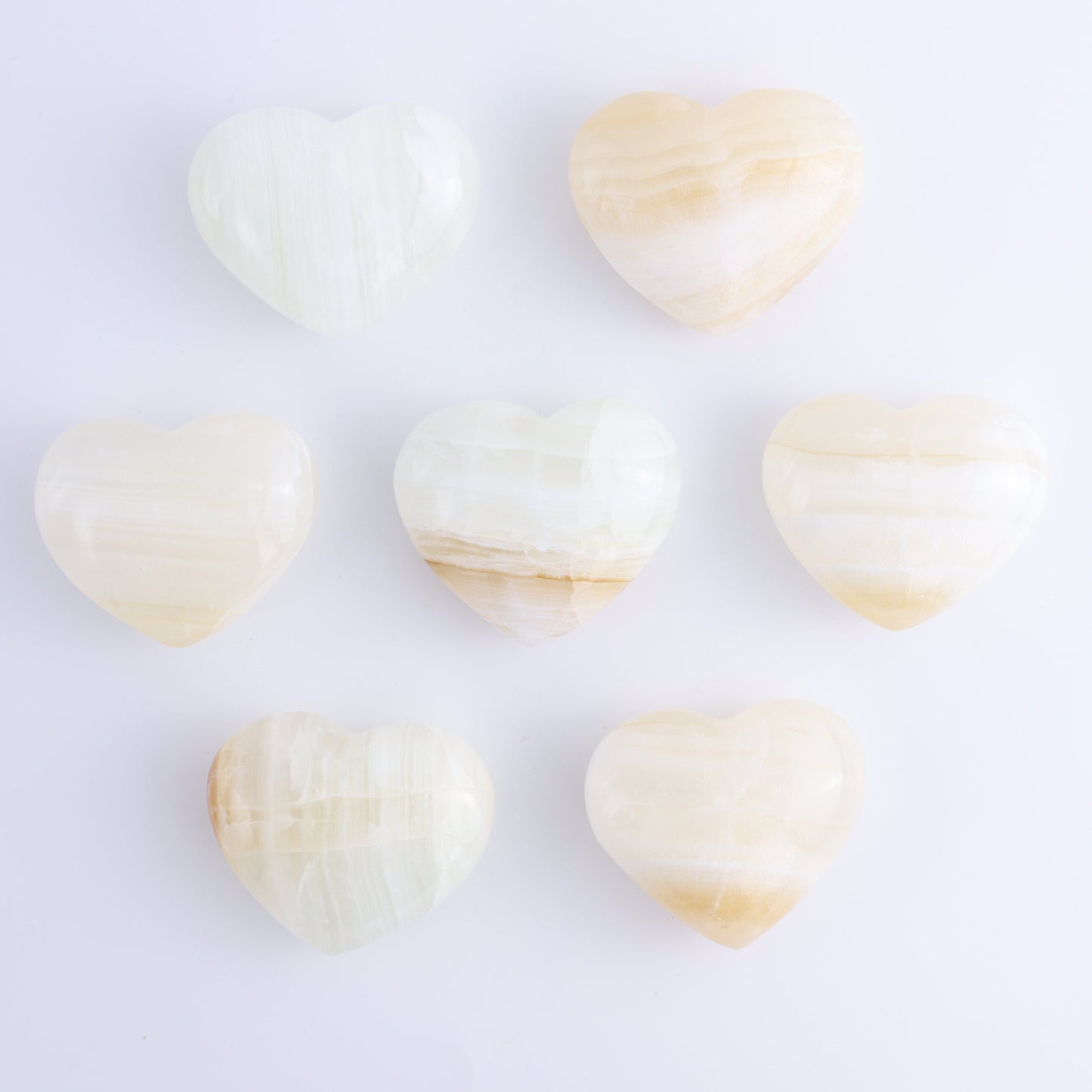 Onyx/Calcite Hearts Set of 7 - Expert Wholesale and Supplier of Wholesale Crystals & Bulk Gemstones, ["Calcite","Hearts","Mexico","onyx"]