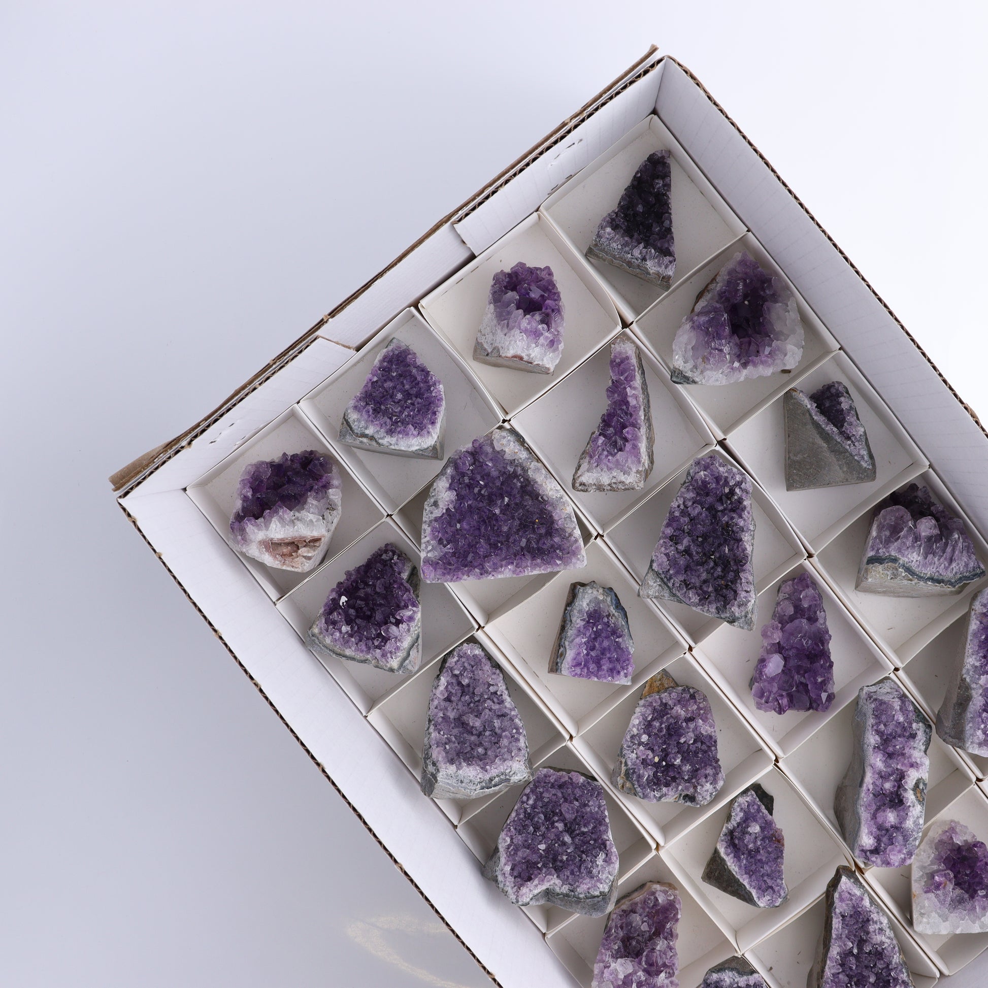 Amethyst Cut Base Set of 24 - Expert Wholesale and Supplier of Wholesale Crystals & Bulk Gemstones, ["Amethyst","Cut Base"]