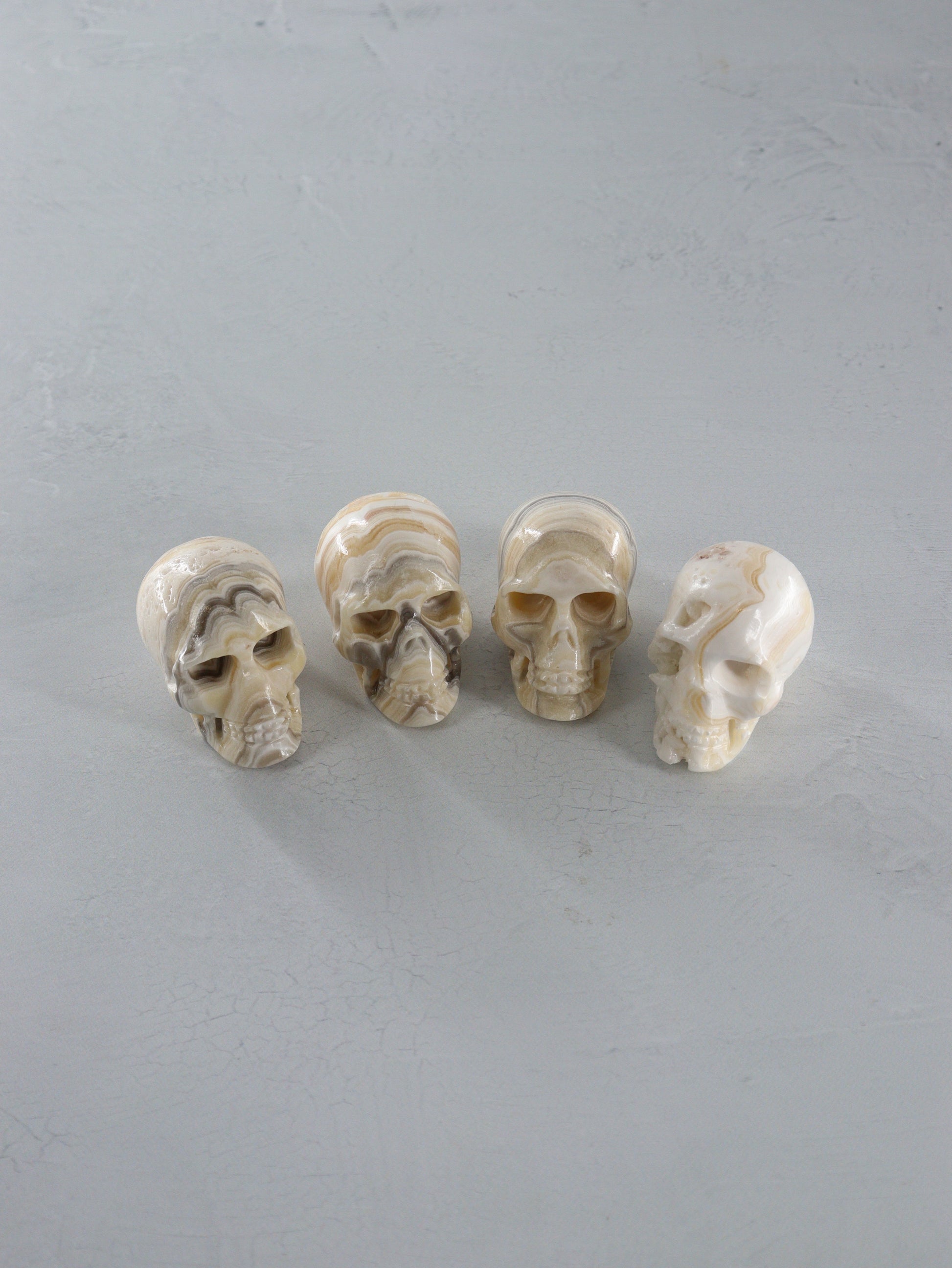 Onyx Skulls Set of 4 - Expert Wholesale and Supplier of Wholesale Crystals & Bulk Gemstones, []