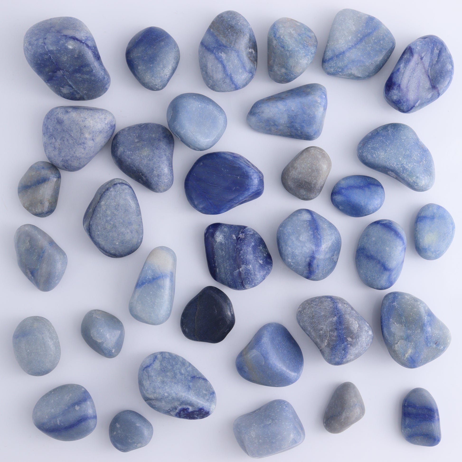 Blue Quartz tumbles 1 kg Set - Expert Wholesale and Supplier of Wholesale Crystals & Bulk Gemstones, ["Blue Quartz","close_50","Madagascar","Palm Stones","Quartz"]