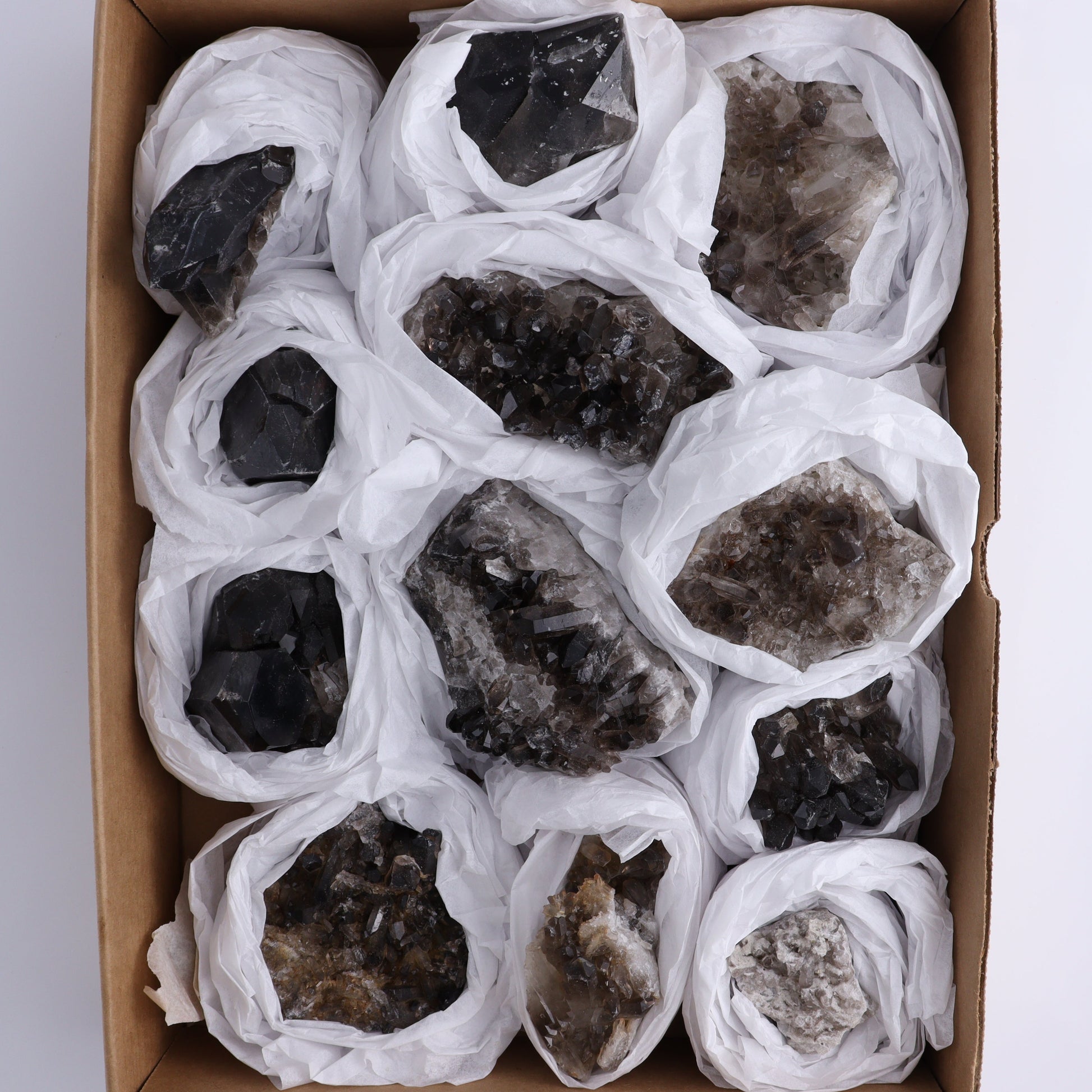 Smoky Quartz Clusters Set of 12 - Expert Wholesale and Supplier of Wholesale Crystals & Bulk Gemstones, ["Brazil","close_70","cluster","Clusters","Quartz","Smoky Quartz"]