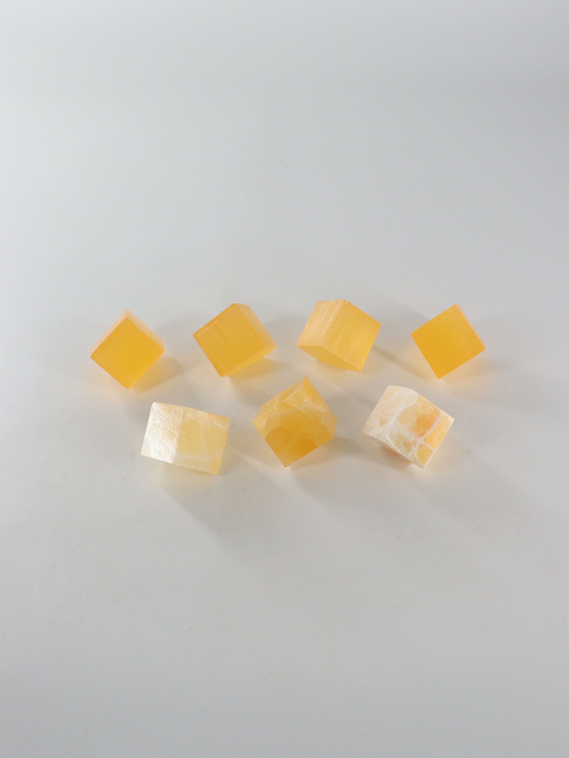 Calcite Cubes Set of 7 - Expert Wholesale and Supplier of Wholesale Crystals & Bulk Gemstones, ["Calcite","close_50","Flats","Freeforms","Honey Calcite","Utah"]