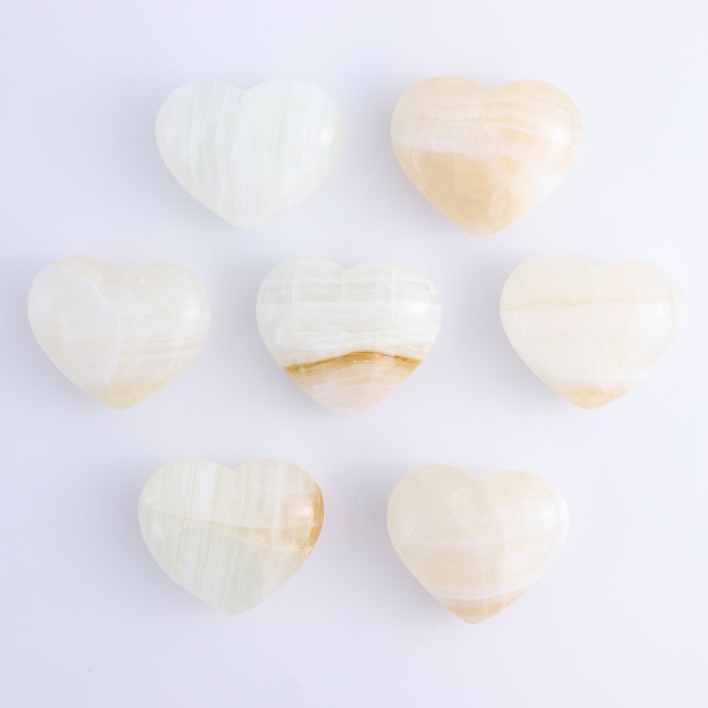 Onyx/Calcite Hearts Set of 7 - Expert Wholesale and Supplier of Wholesale Crystals & Bulk Gemstones, ["Calcite","Hearts","Mexico","onyx"]