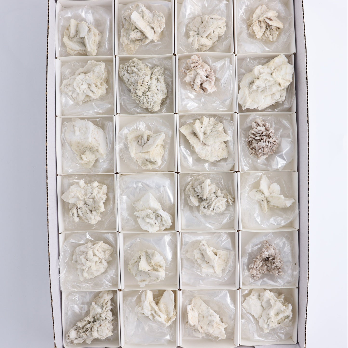 Gypsum ps. Glauberite from Camp Verde Set of 24 - Expert Wholesale and Supplier of Wholesale Crystals & Bulk Gemstones, ["Arizona","Glauberite","Gypsum","Gypsum ps Glauberite","United States"]