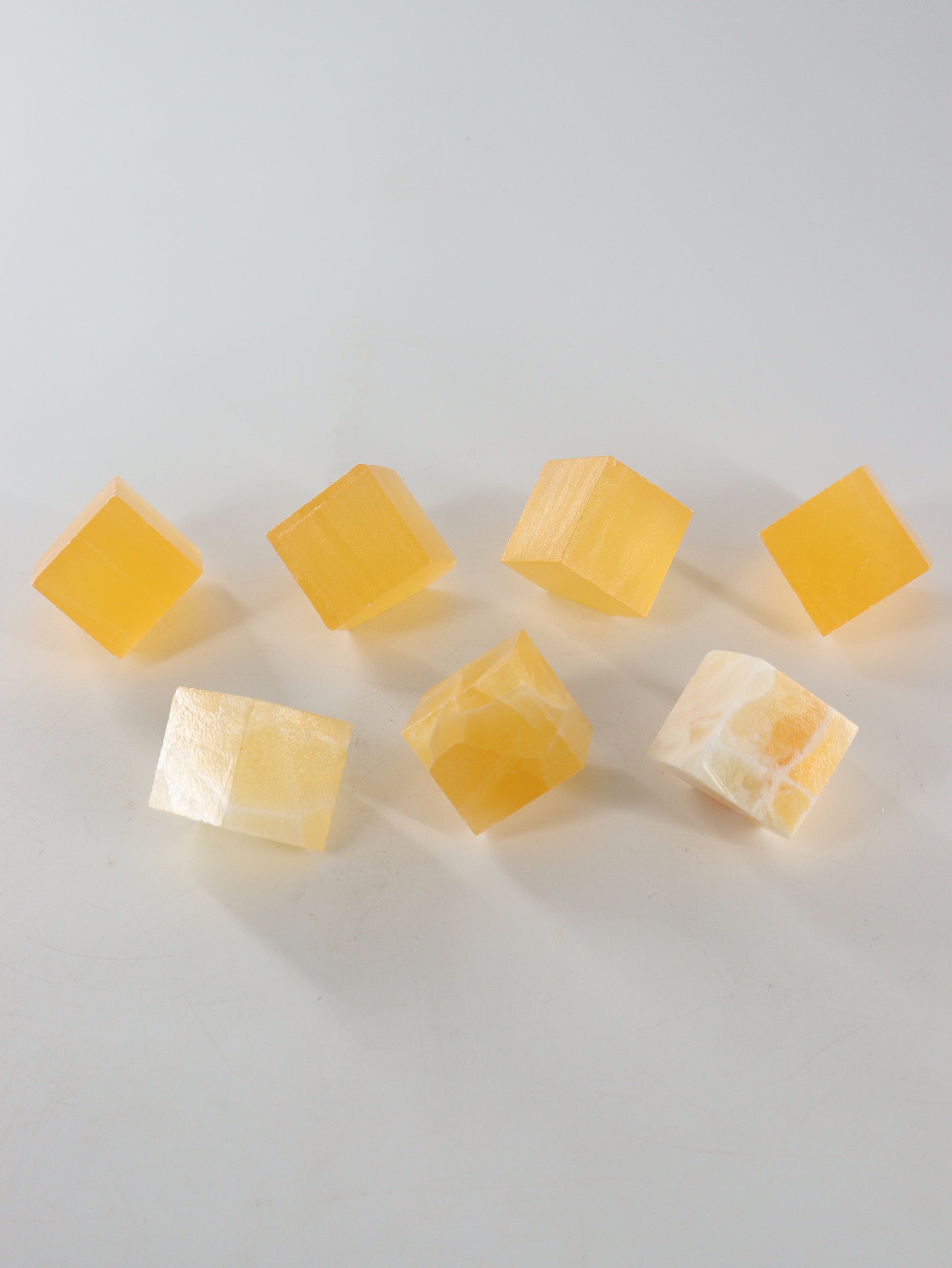 Calcite Cubes Set of 7 - Expert Wholesale and Supplier of Wholesale Crystals & Bulk Gemstones, ["Calcite","close_50","Flats","Freeforms","Honey Calcite","Utah"]