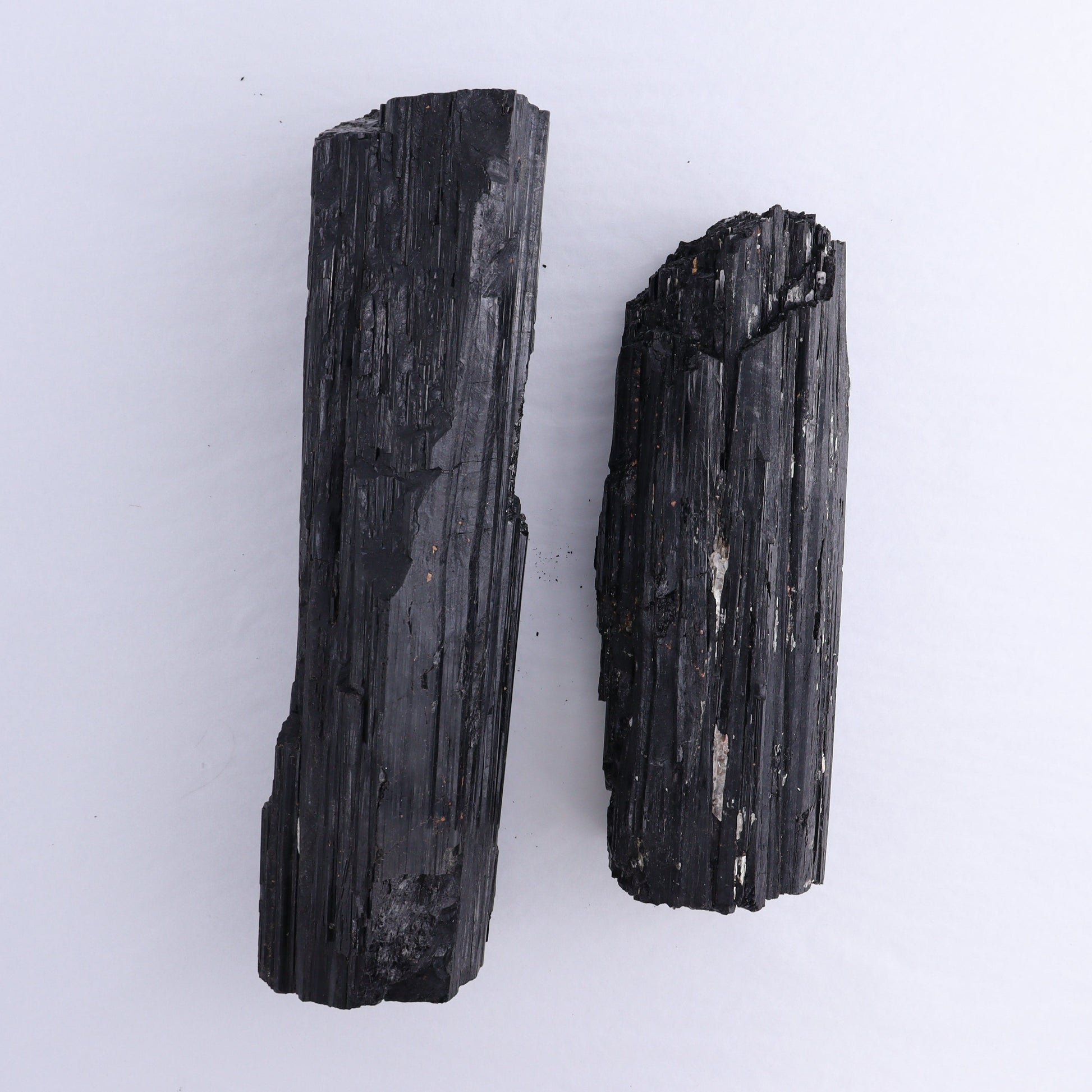 Black Tourmaline Log Set of 2 - Expert Wholesale and Supplier of Wholesale Crystals & Bulk Gemstones, ["Black Tourmaline","logs","Madagascar","Rough","Tourmaline"]