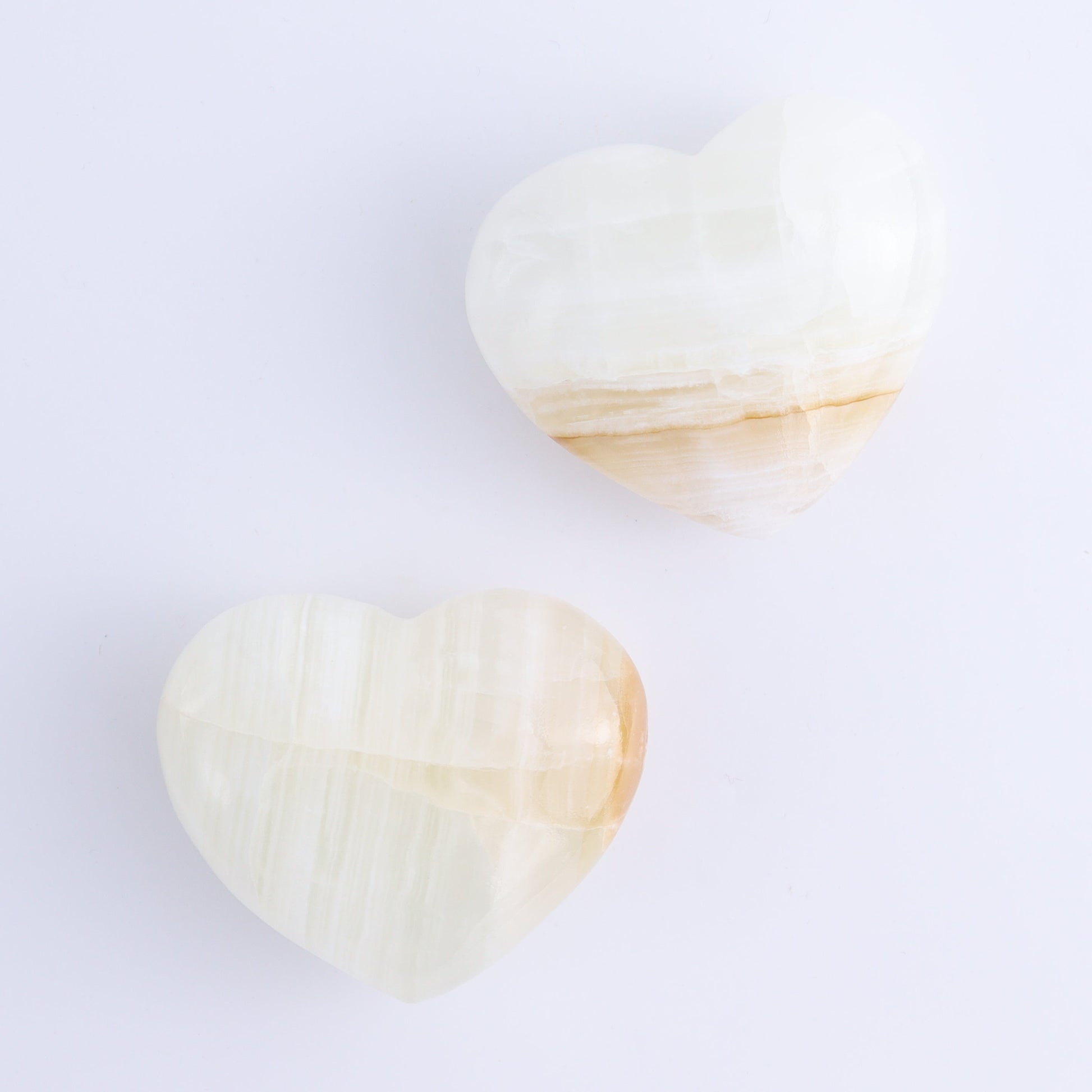 Onyx/Calcite Hearts Set of 7 - Expert Wholesale and Supplier of Wholesale Crystals & Bulk Gemstones, ["Calcite","Hearts","Mexico","onyx"]