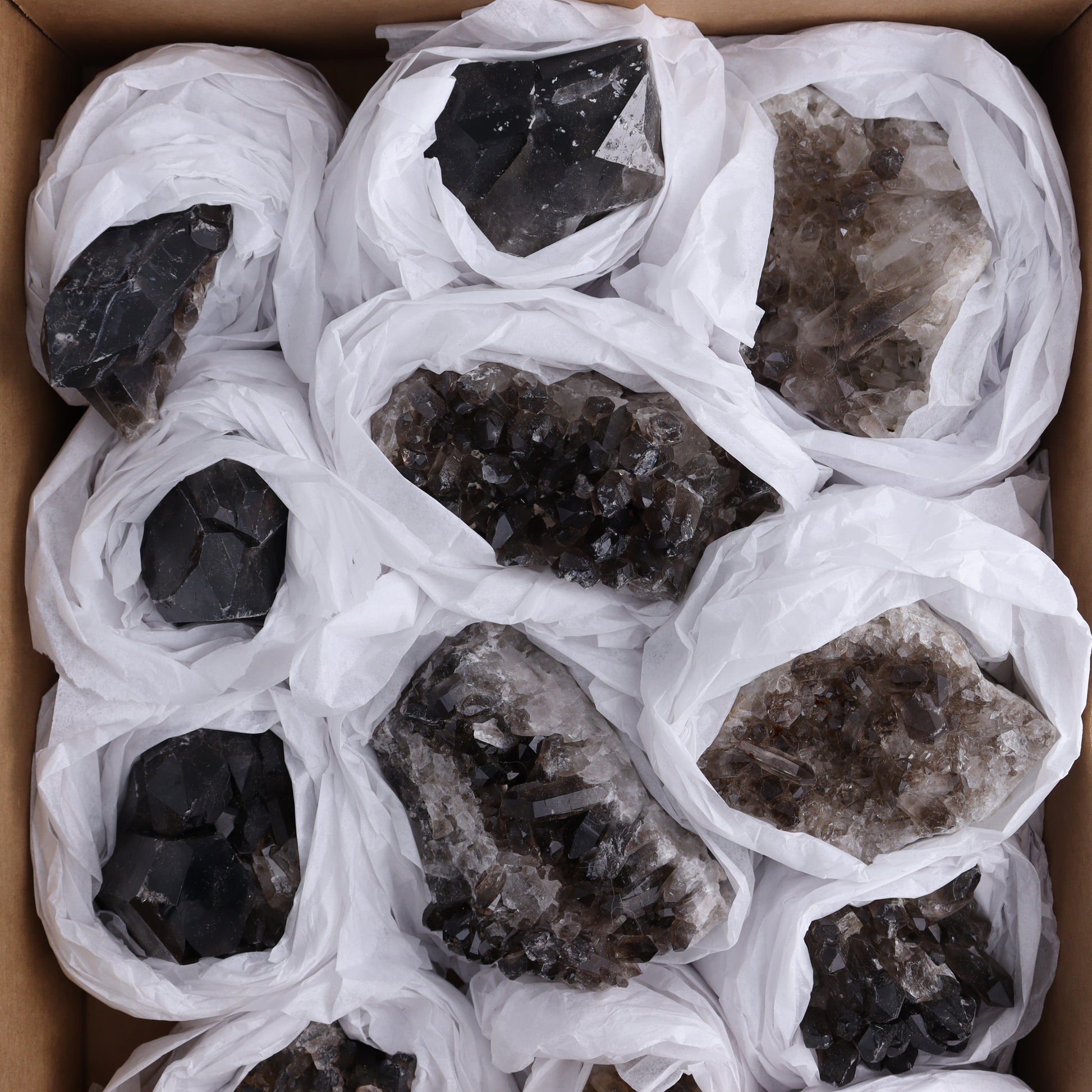 Smoky Quartz Clusters Set of 12 - Expert Wholesale and Supplier of Wholesale Crystals & Bulk Gemstones, ["Brazil","close_70","cluster","Clusters","Quartz","Smoky Quartz"]