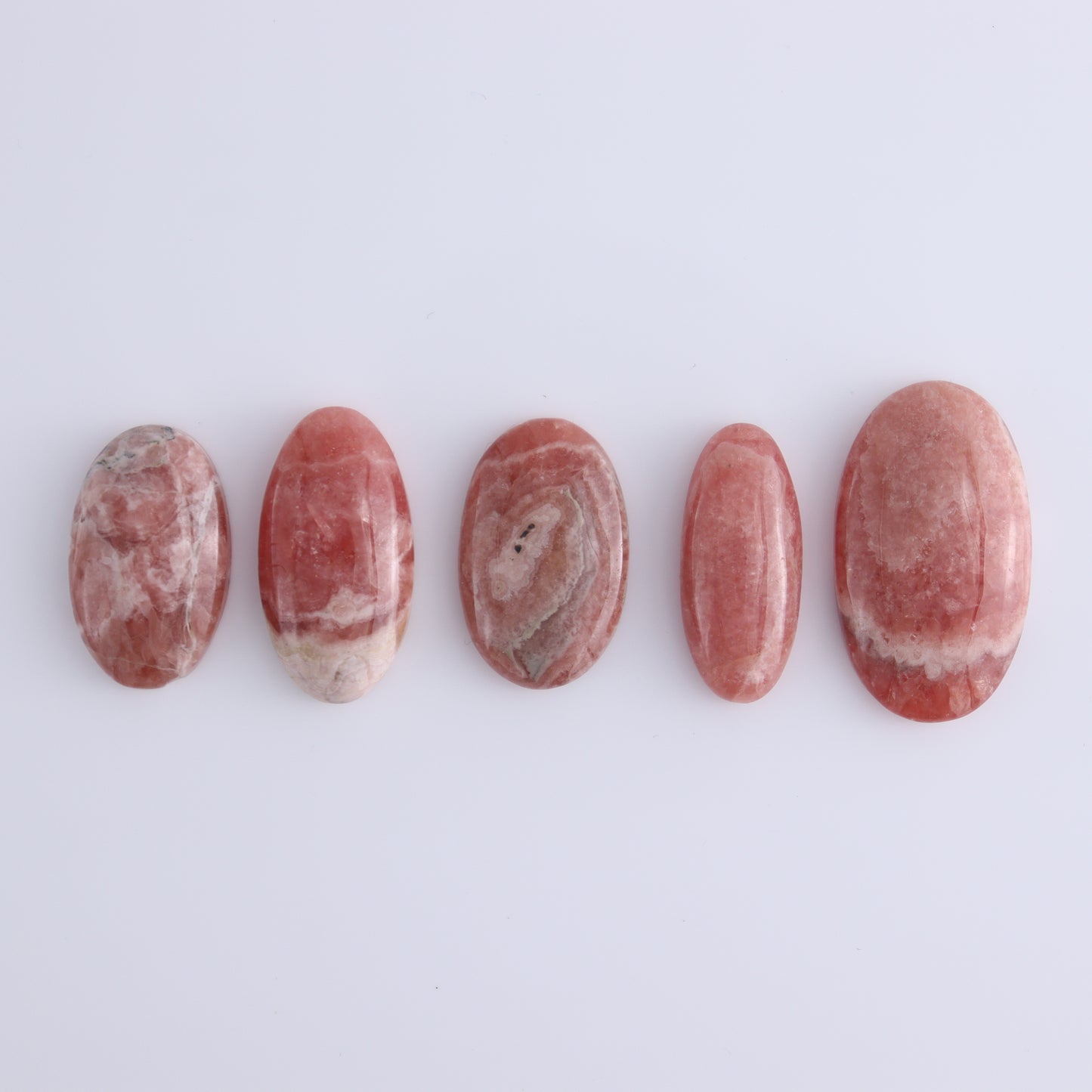Rhodochrosite Oval Cabs Set of 8 - Expert Wholesale and Supplier of Wholesale Crystals & Bulk Gemstones, ["Argentina","Cabs","Oval","Rhodochrosite"]