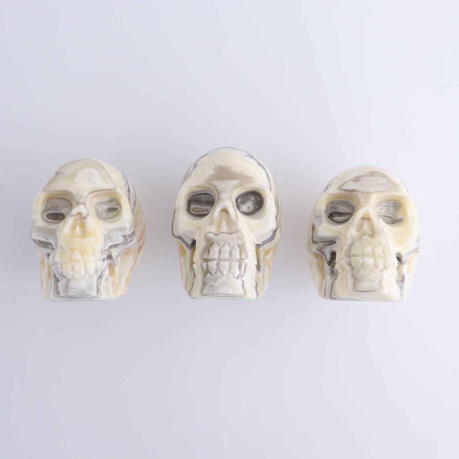 Onyx Skulls Set of 3 - Expert Wholesale and Supplier of Wholesale Crystals & Bulk Gemstones, ["Mexico","onyx","Skulls"]