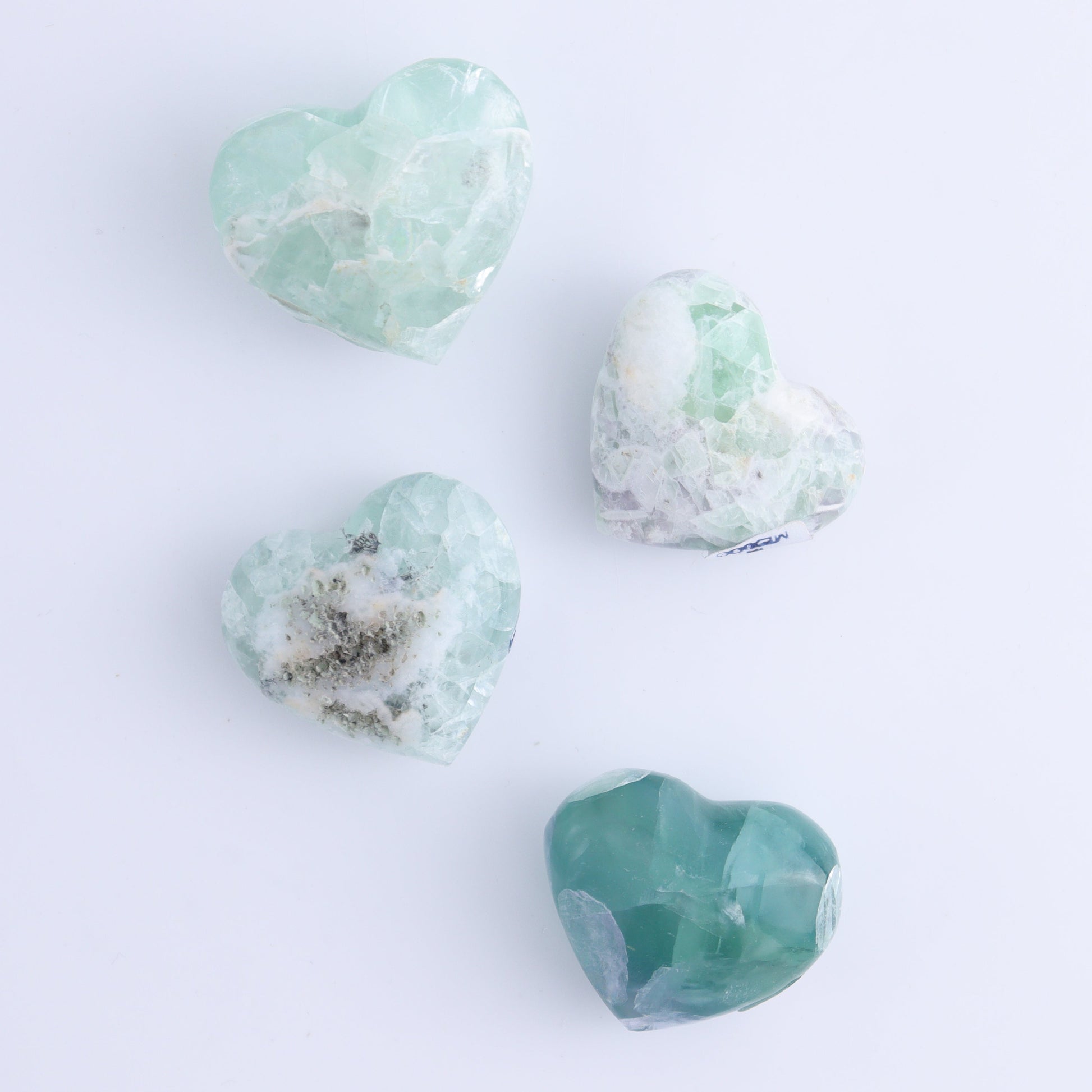 Fluorite Hearts Set of 7 - Expert Wholesale and Supplier of Wholesale Crystals & Bulk Gemstones, ["Fluorite","Hearts","Mexico"]