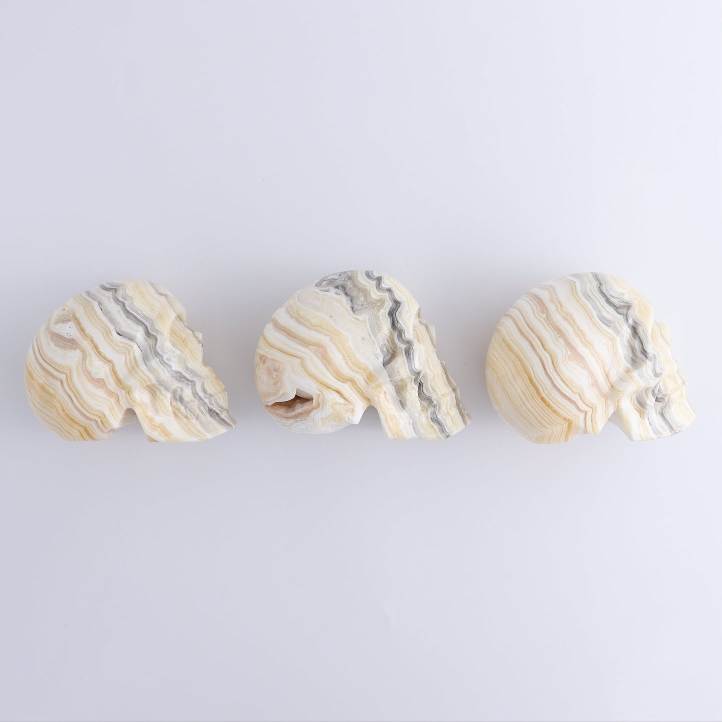 Onyx Skulls Set of 3 - Expert Wholesale and Supplier of Wholesale Crystals & Bulk Gemstones, ["Mexico","onyx","Skulls"]