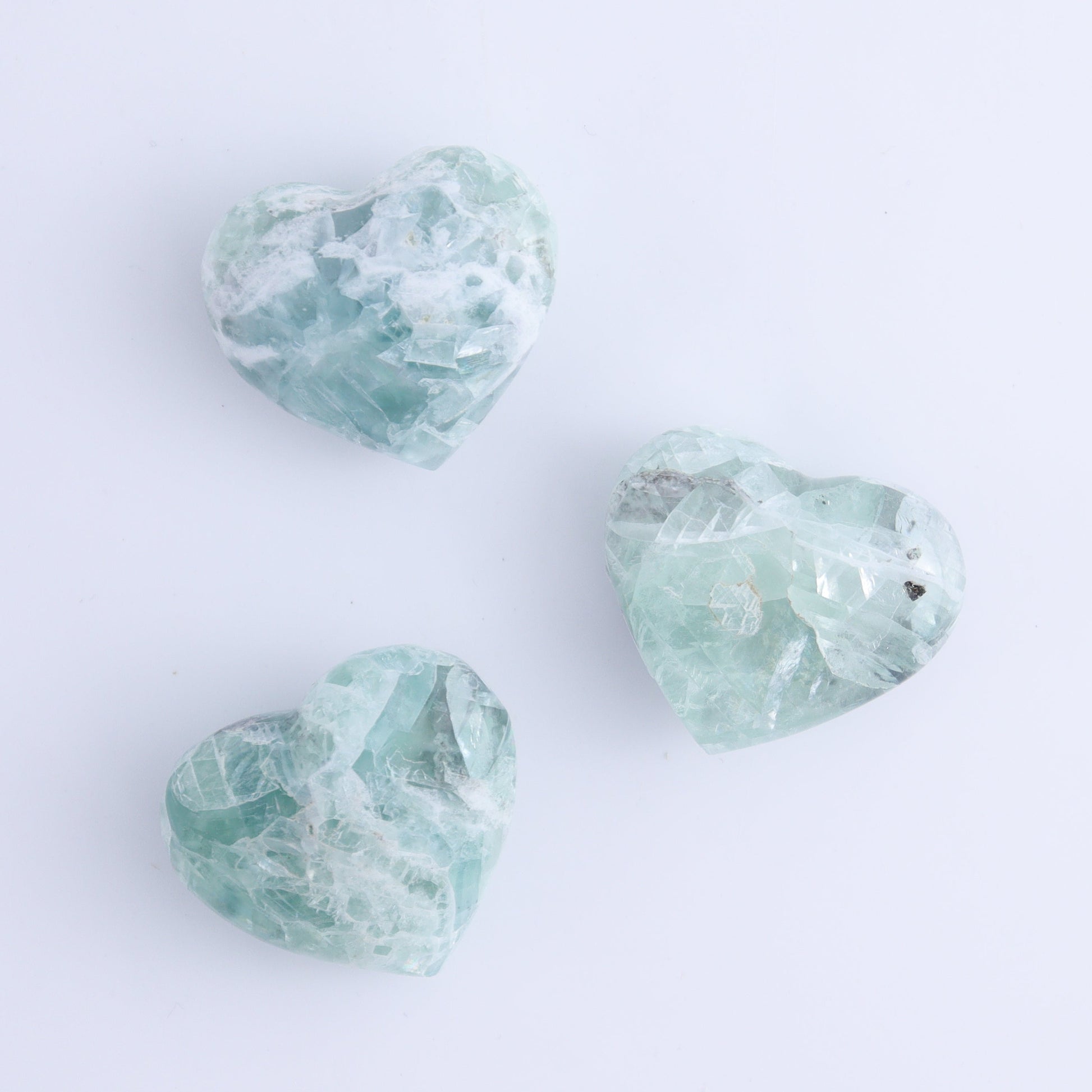 Fluorite Hearts Set of 7 - Expert Wholesale and Supplier of Wholesale Crystals & Bulk Gemstones, ["Fluorite","Hearts","Mexico"]
