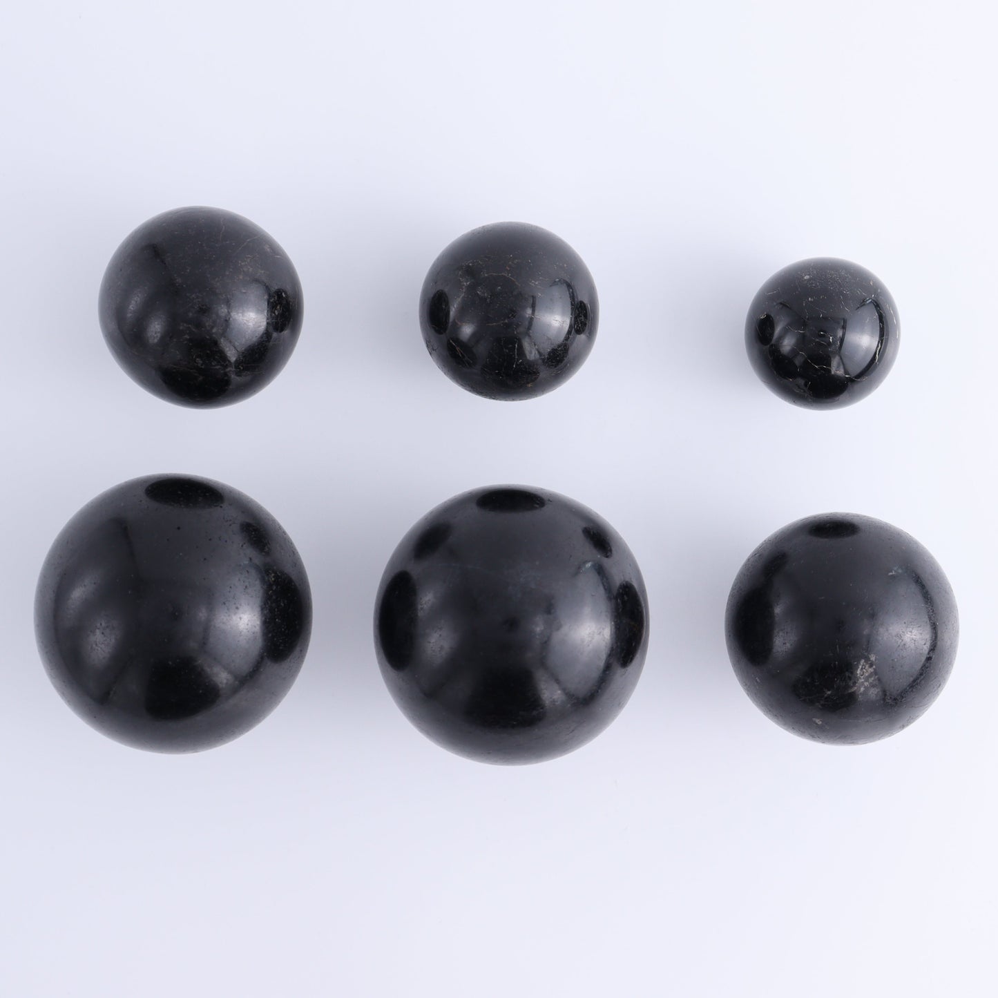 Black Tourmaline Spheres Set of 6 - Expert Wholesale and Supplier of Wholesale Crystals & Bulk Gemstones, ["Black Tourmaline","Spheres","Tourmaline"]