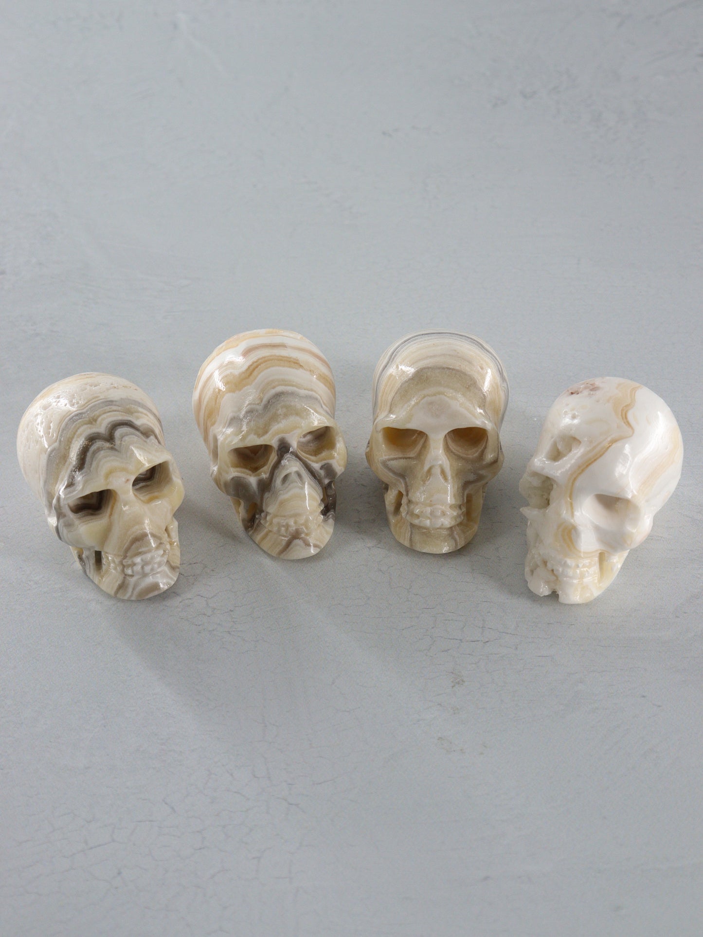 Onyx Skulls Set of 4 - Expert Wholesale and Supplier of Wholesale Crystals & Bulk Gemstones, []