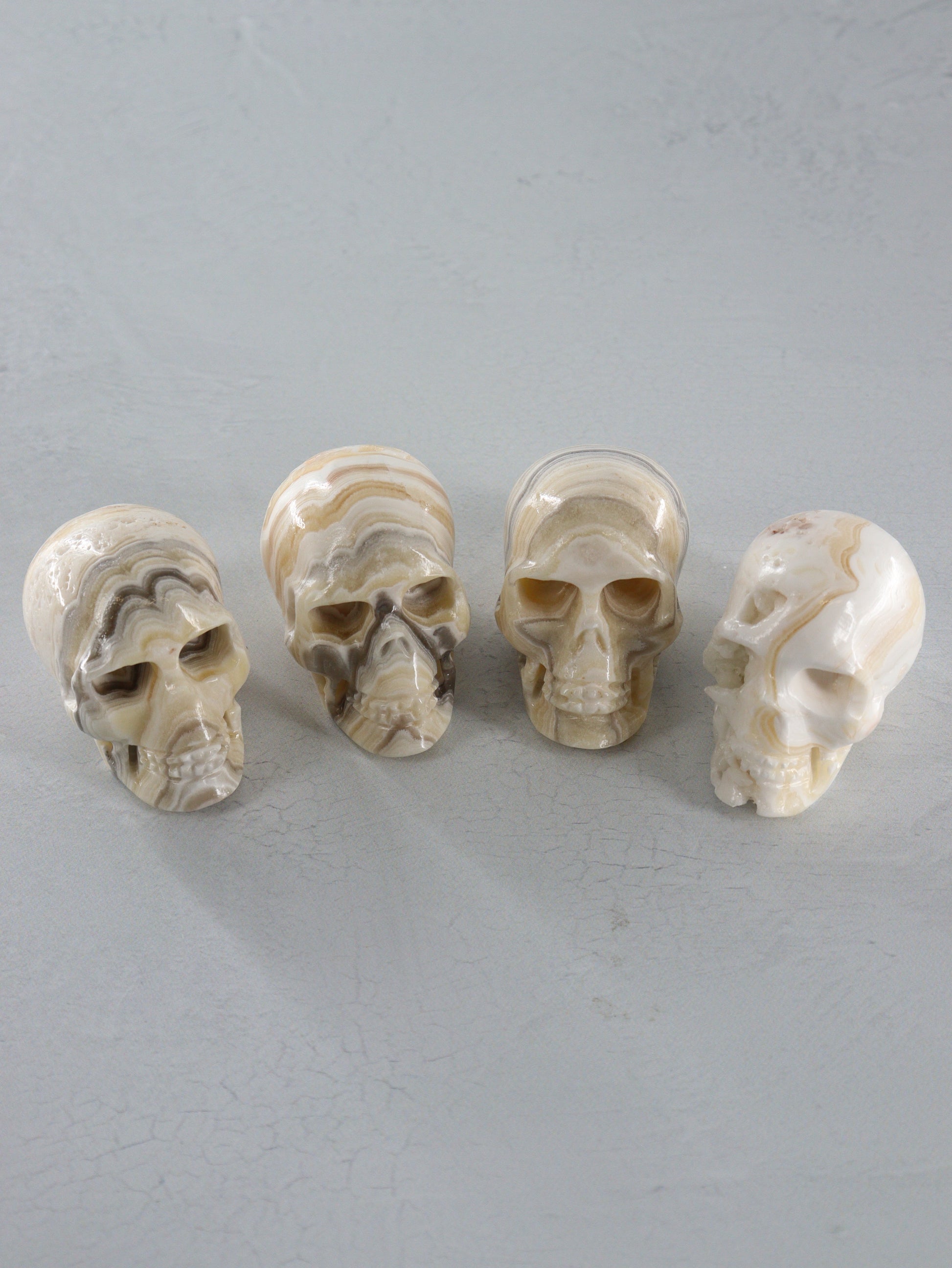 Onyx Skulls Set of 4 - Expert Wholesale and Supplier of Wholesale Crystals & Bulk Gemstones, []