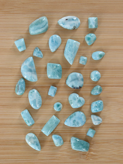 Larimar Cabs Set of 29 - Expert Wholesale and Supplier of Wholesale Crystals & Bulk Gemstones, ["Cabs","Larimar","Mixed Carvings"]