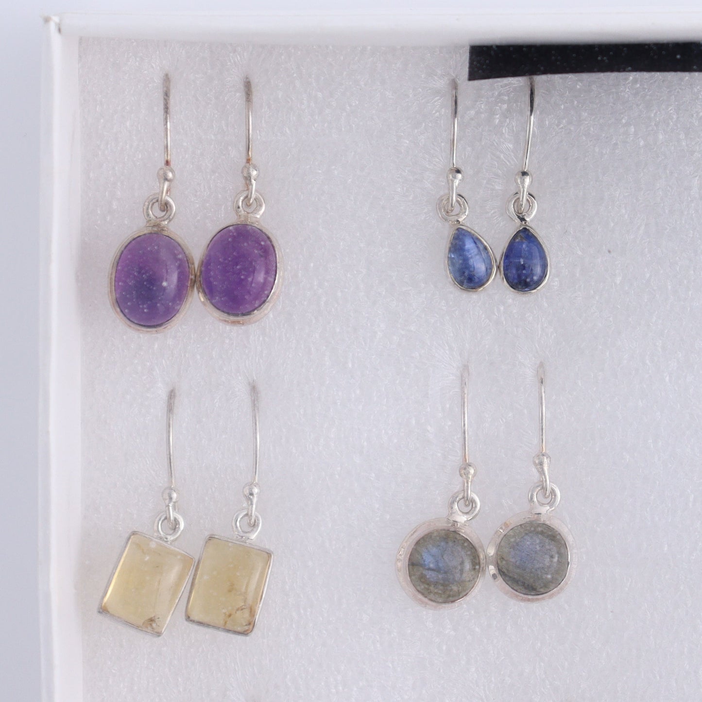 Mixed Gemstones Earrings Set of 9 - Expert Wholesale and Supplier of Wholesale Crystals & Bulk Gemstones, ["Amethyst","Citrine","close_50","earrings","ethiopian opal","Golden Rutile","India","Kyanite","Labradorite","Rainbow Moonstone","Rose Quartz","sterling silver"]