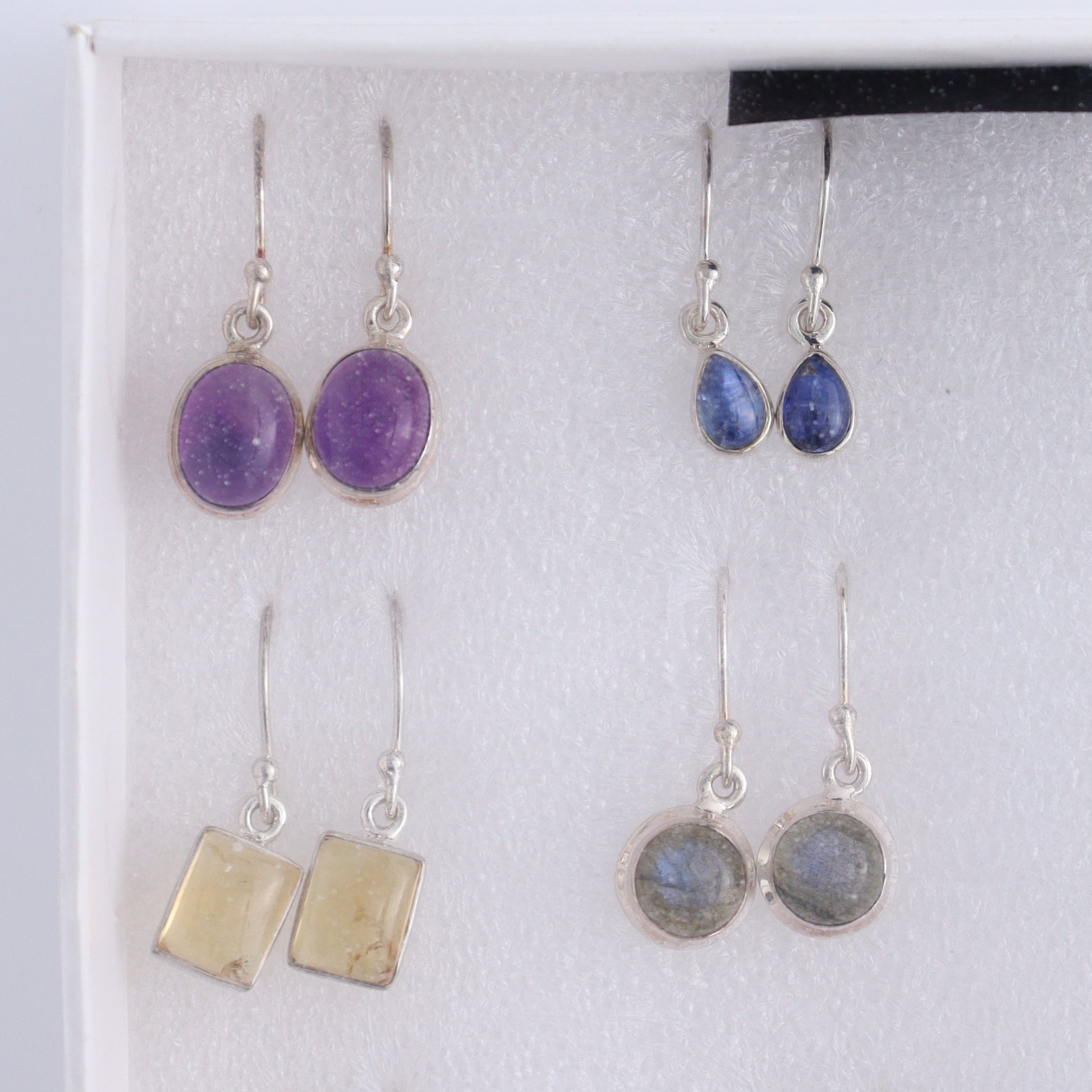 Mixed Gemstones Earrings Set of 9 - Expert Wholesale and Supplier of Wholesale Crystals & Bulk Gemstones, ["Amethyst","Citrine","close_50","earrings","ethiopian opal","Golden Rutile","India","Kyanite","Labradorite","Rainbow Moonstone","Rose Quartz","sterling silver"]