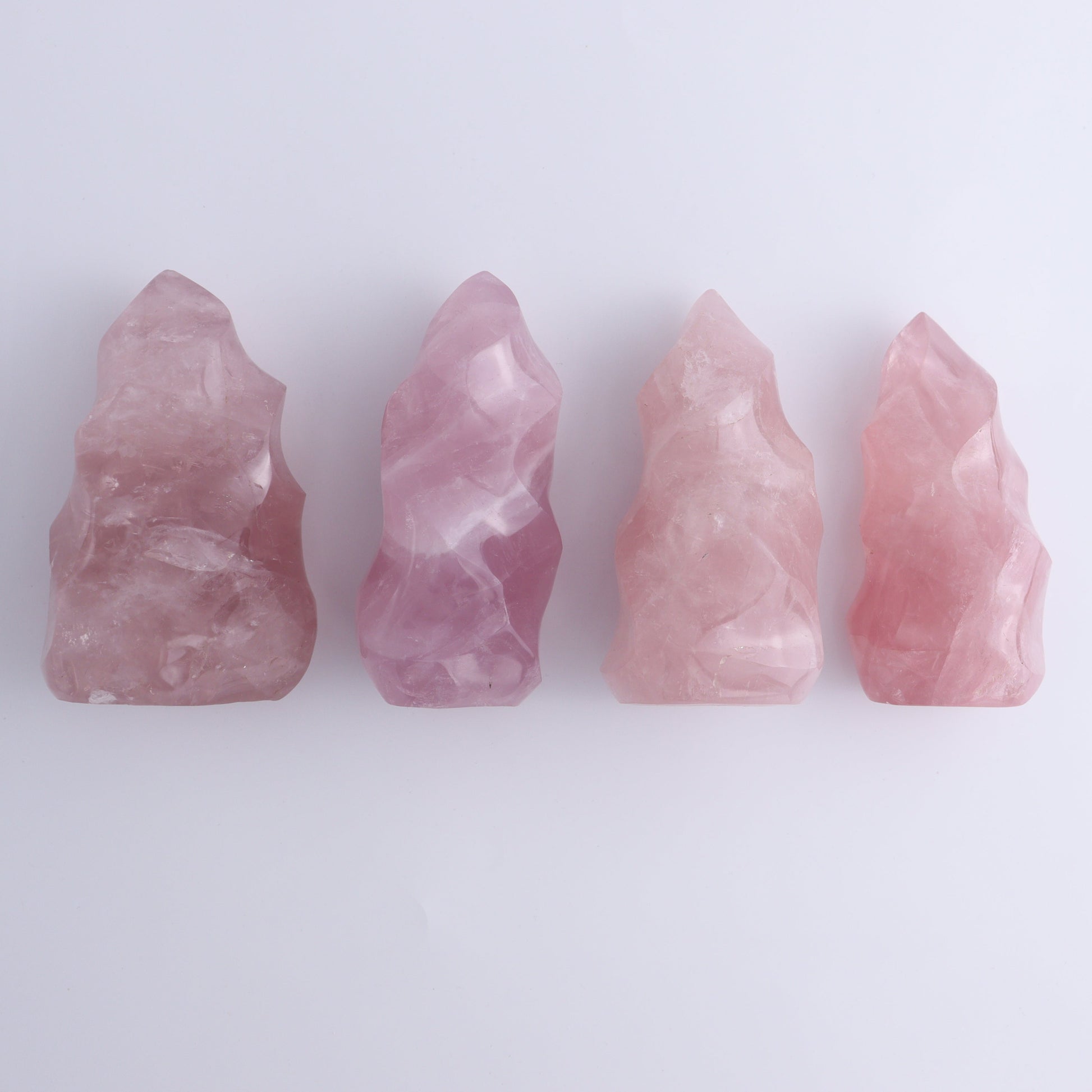 Rose Quartz Flames Set of 4 - Expert Wholesale and Supplier of Wholesale Crystals & Bulk Gemstones, ["flames","Madagascar","Quartz","Rose Quartz"]