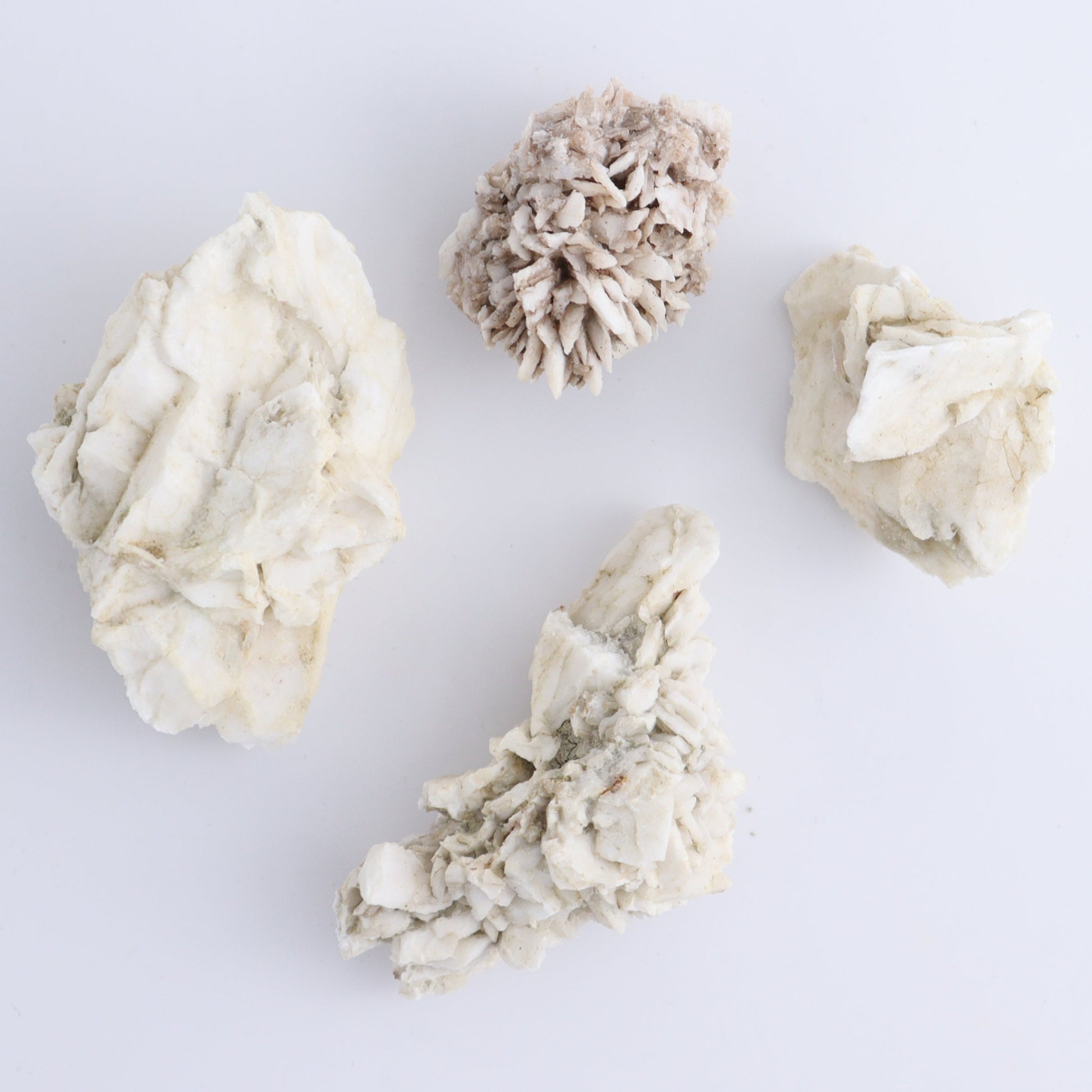 Gypsum ps. Glauberite from Camp Verde Set of 24 - Expert Wholesale and Supplier of Wholesale Crystals & Bulk Gemstones, ["Arizona","Glauberite","Gypsum","Gypsum ps Glauberite","United States"]