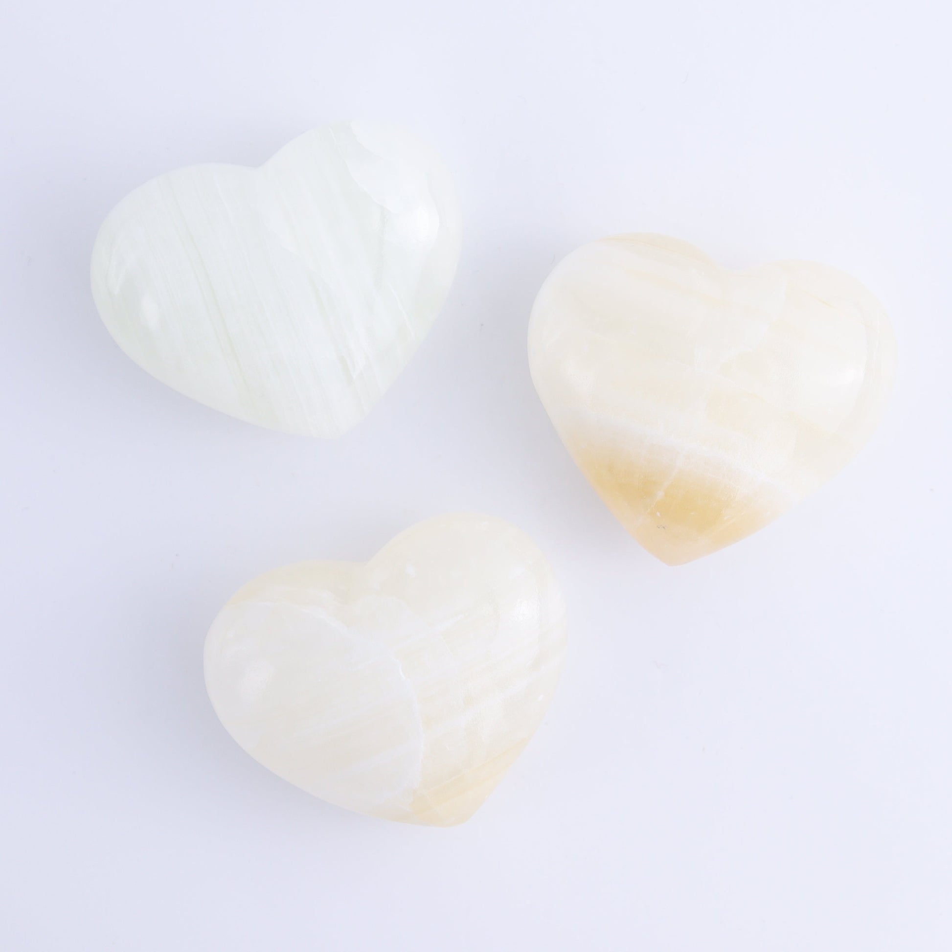 Onyx/Calcite Hearts Set of 7 - Expert Wholesale and Supplier of Wholesale Crystals & Bulk Gemstones, ["Calcite","Hearts","Mexico","onyx"]