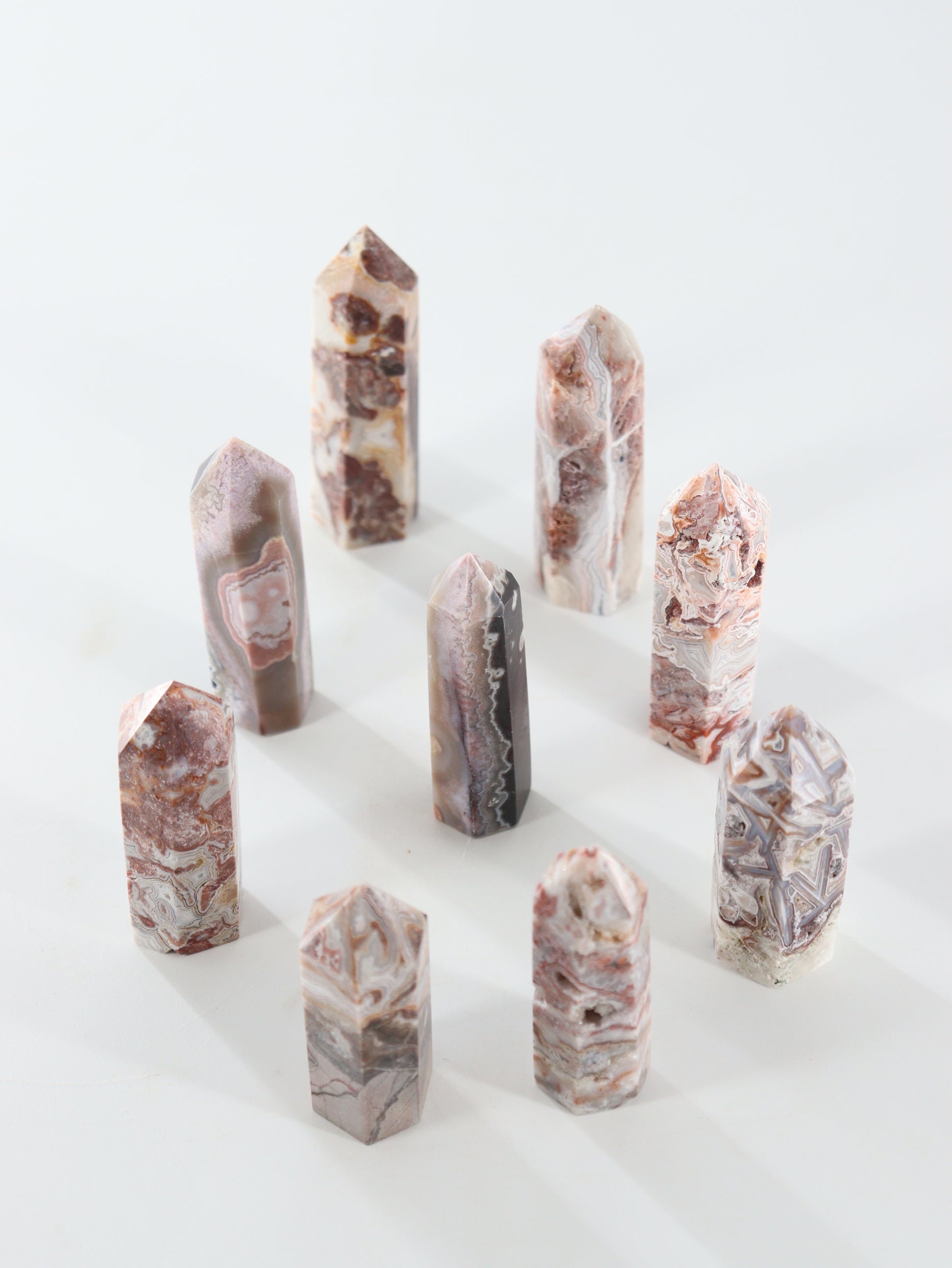 Crazy Lace Agate Towers Set of 9 - Expert Wholesale and Supplier of Wholesale Crystals & Bulk Gemstones, []