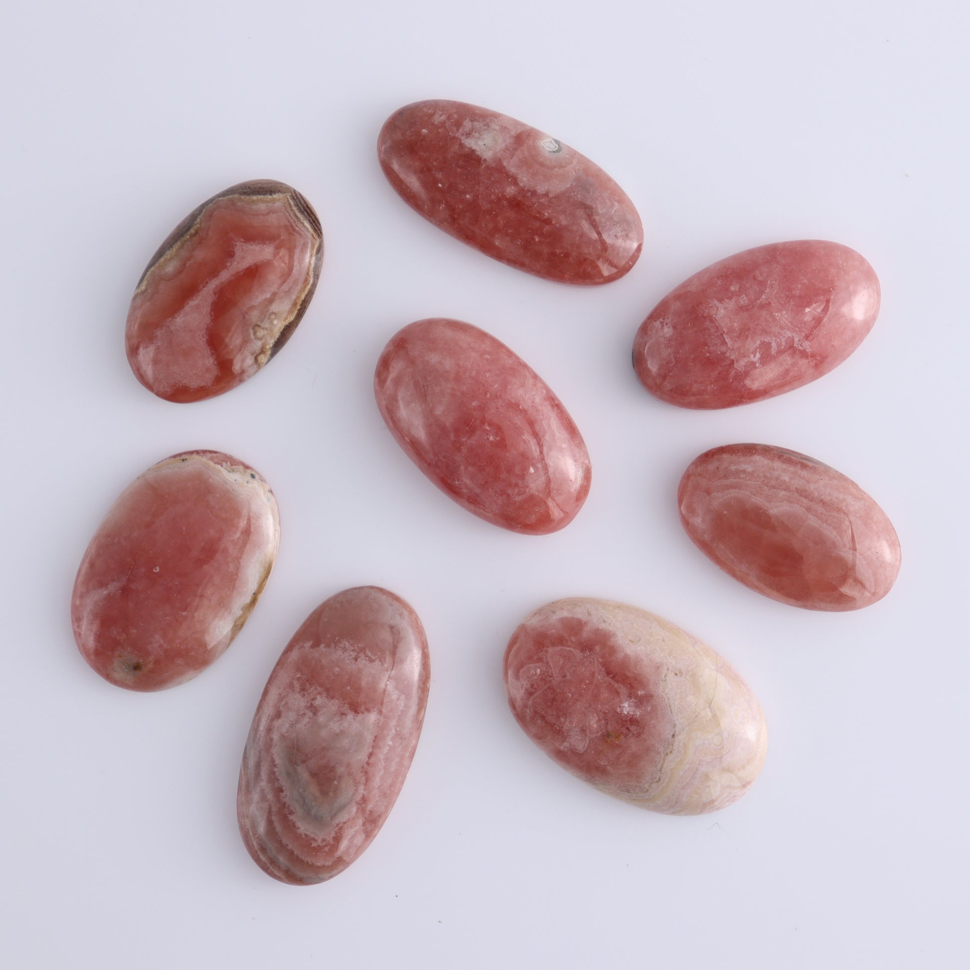 Rhodochrosite Oval Cabs Set of 8 - Expert Wholesale and Supplier of Wholesale Crystals & Bulk Gemstones, ["Argentina","Cabs","Oval","Rhodochrosite"]