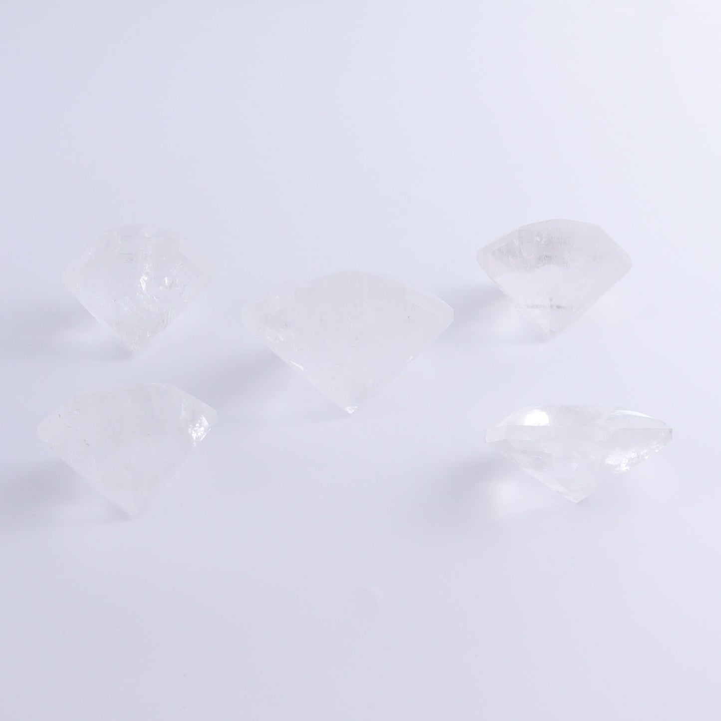 Quartz Diamond Shaped Carvings Set of 5 - Expert Wholesale and Supplier of Wholesale Crystals & Bulk Gemstones, ["Brazil","Clear Quartz","Mixed Carvings","Quartz"]
