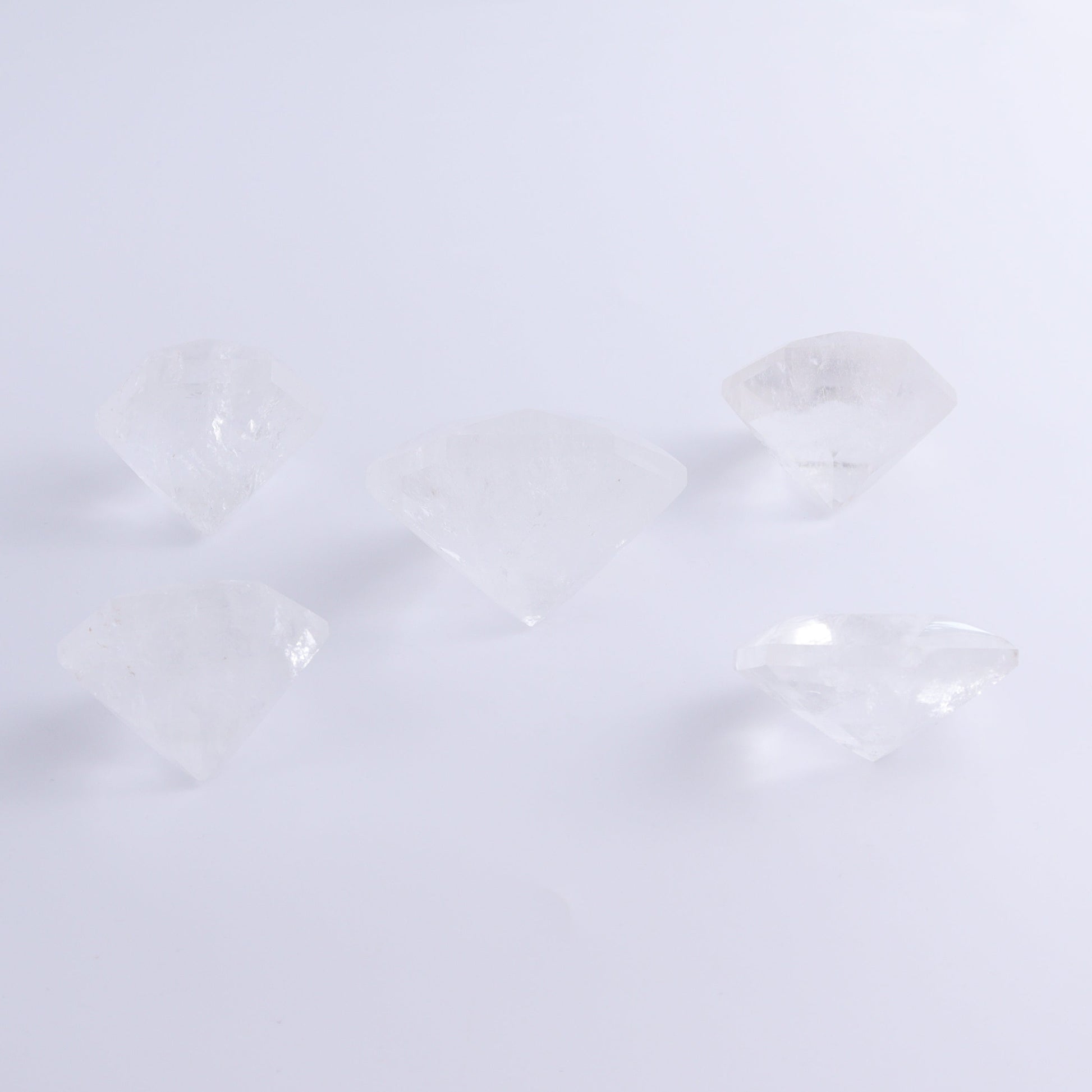Quartz Diamond Shaped Carvings Set of 5 - Expert Wholesale and Supplier of Wholesale Crystals & Bulk Gemstones, ["Brazil","Clear Quartz","Mixed Carvings","Quartz"]