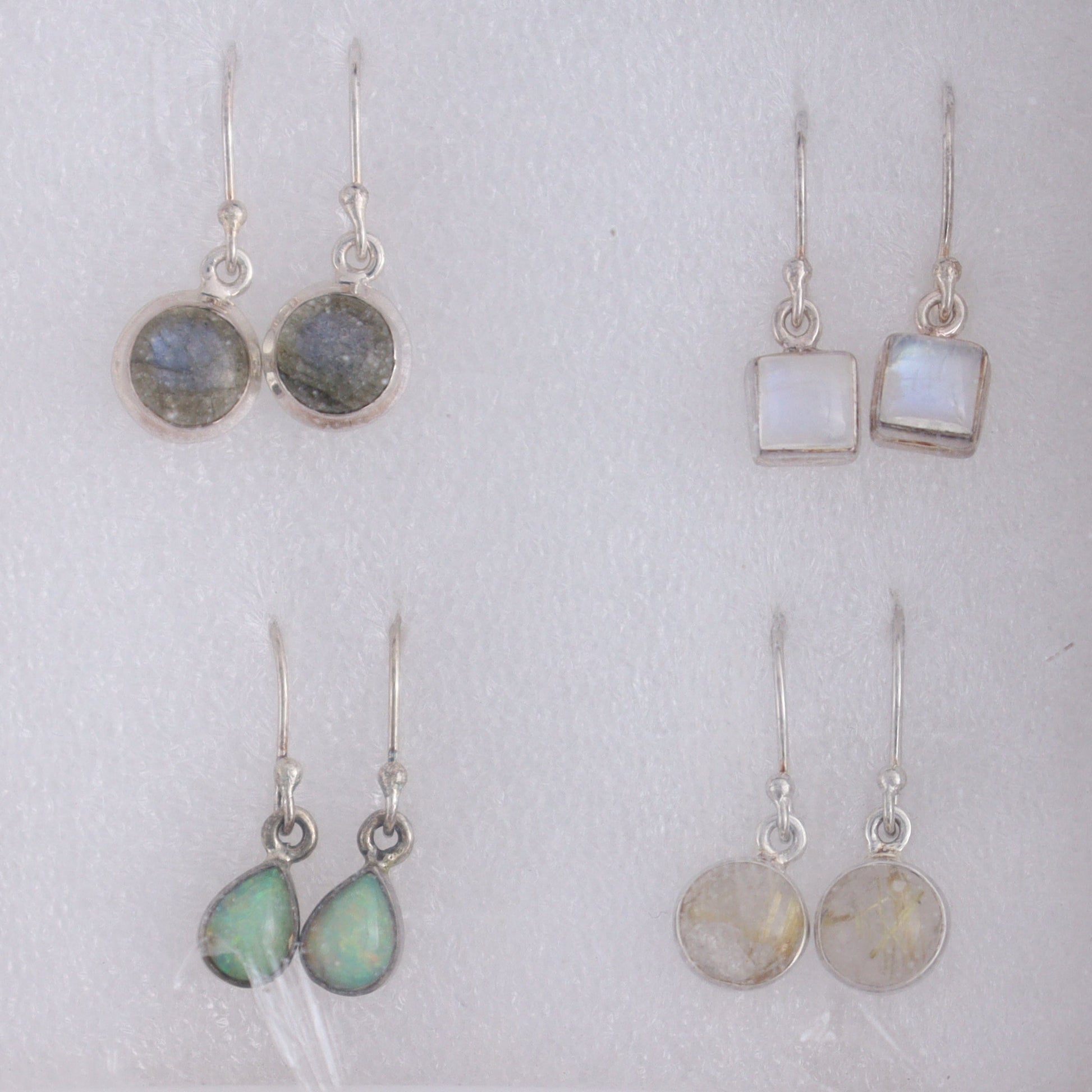Mixed Gemstones Earrings Set of 9 - Expert Wholesale and Supplier of Wholesale Crystals & Bulk Gemstones, ["Amethyst","Citrine","close_50","earrings","ethiopian opal","Golden Rutile","India","Kyanite","Labradorite","Rainbow Moonstone","Rose Quartz","sterling silver"]