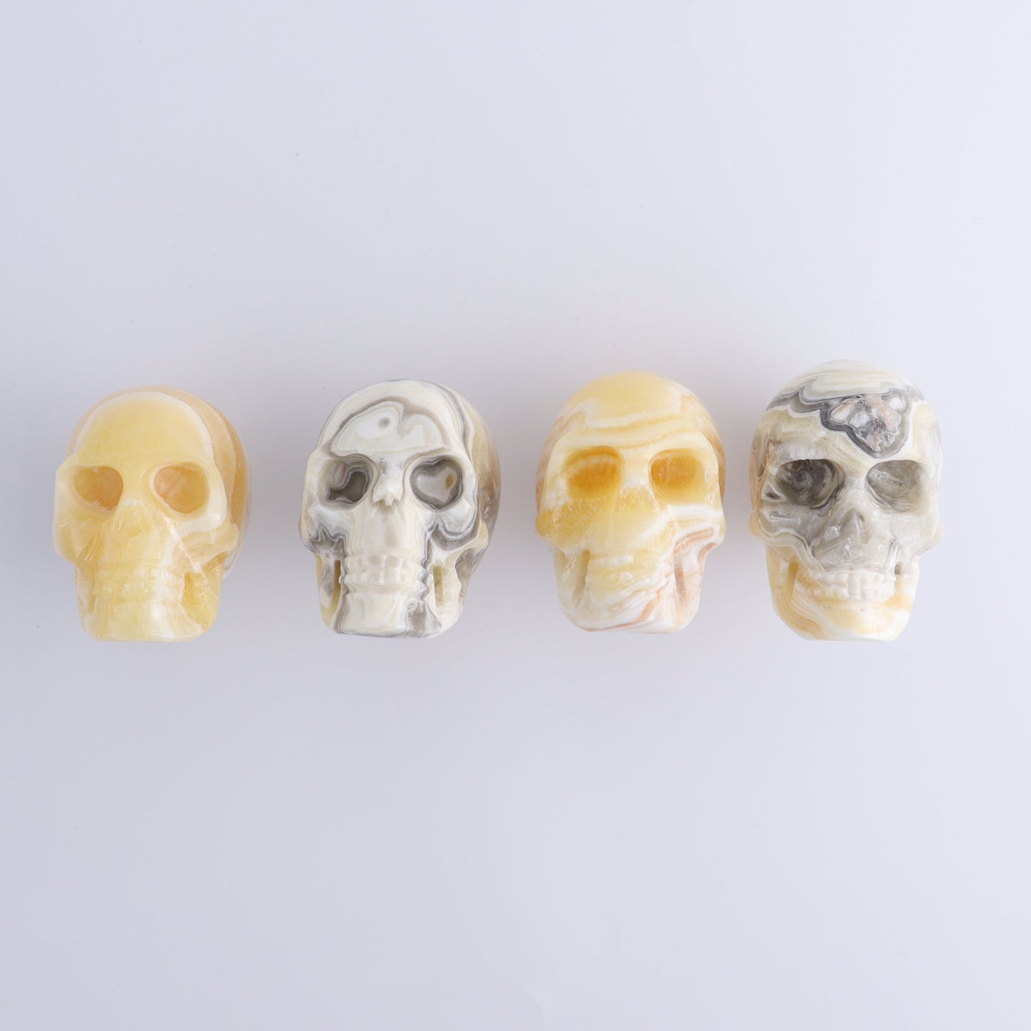 Onyx Skulls Set of 4 - Expert Wholesale and Supplier of Wholesale Crystals & Bulk Gemstones, ["Mexico","onyx","Skulls"]