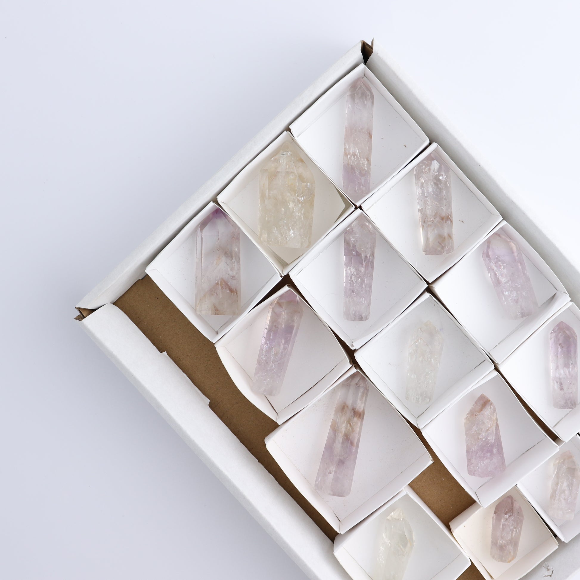 Powellite Amethyst UV Reactive Towers Set of 20 - Expert Wholesale and Supplier of Wholesale Crystals & Bulk Gemstones, ["Amethyst","Powellite"]