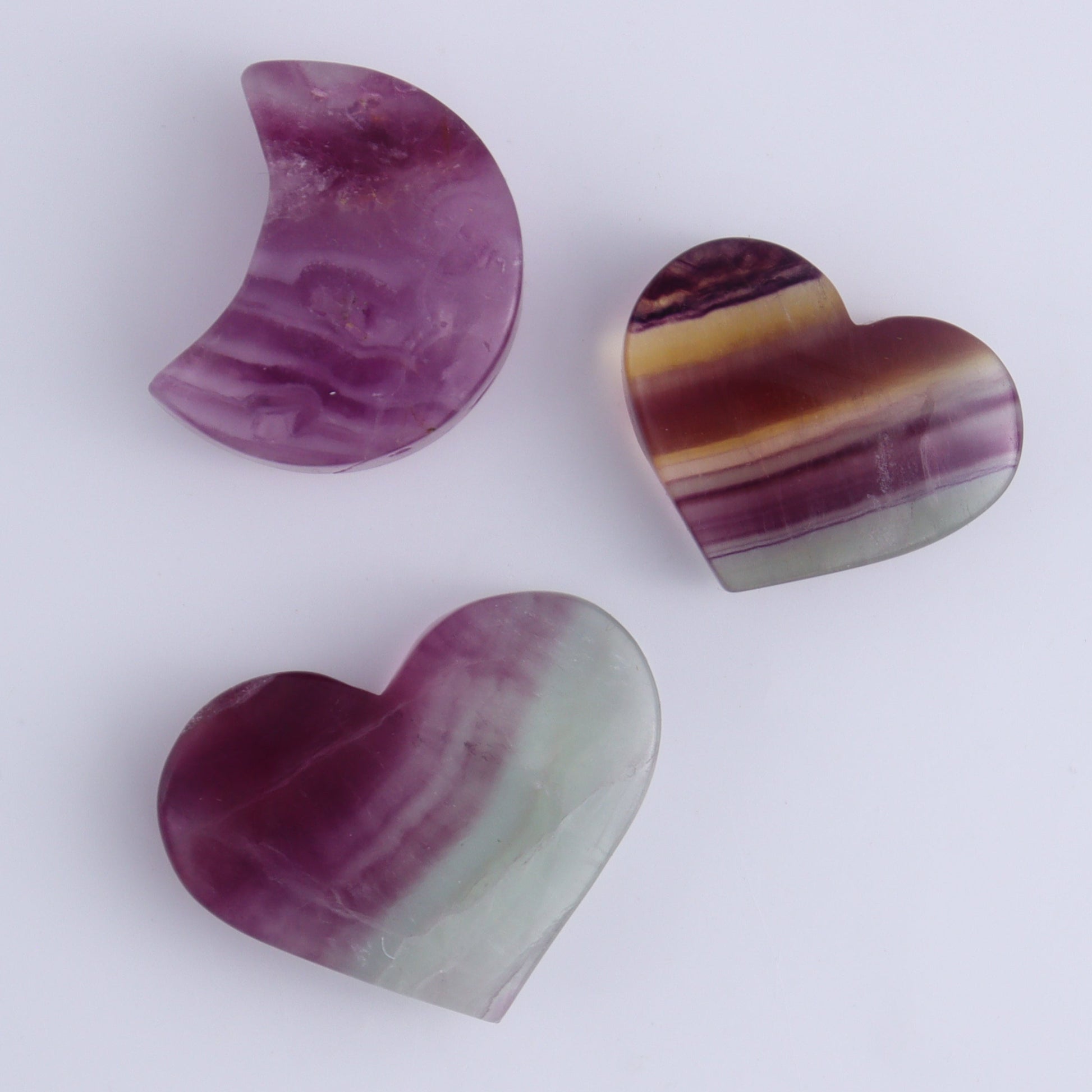 Fluorite Mixed Shapes Set of 7 - Expert Wholesale and Supplier of Wholesale Crystals & Bulk Gemstones, ["Fluorite","heart","Hearts","moons","Oval"]