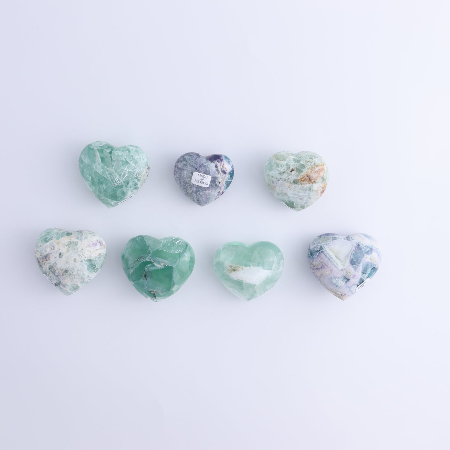 Fluorite Hearts Set of 7 - Expert Wholesale and Supplier of Wholesale Crystals & Bulk Gemstones, ["Fluorite","Hearts","Mexico"]