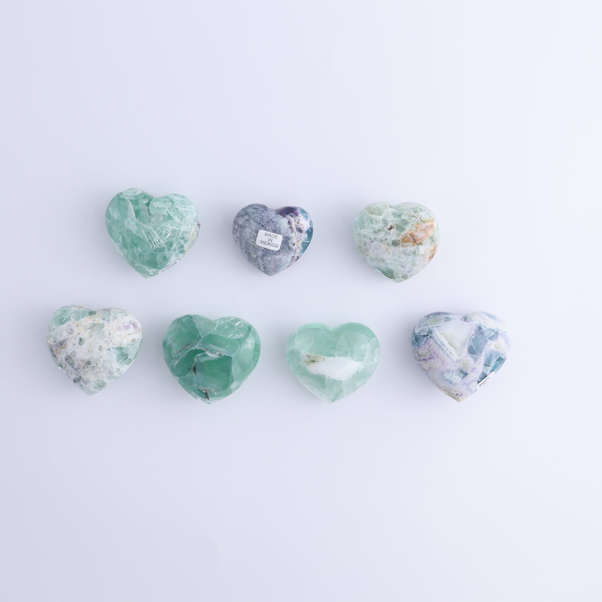 Fluorite Hearts Set of 7 - Expert Wholesale and Supplier of Wholesale Crystals & Bulk Gemstones, ["Fluorite","Hearts","Mexico"]