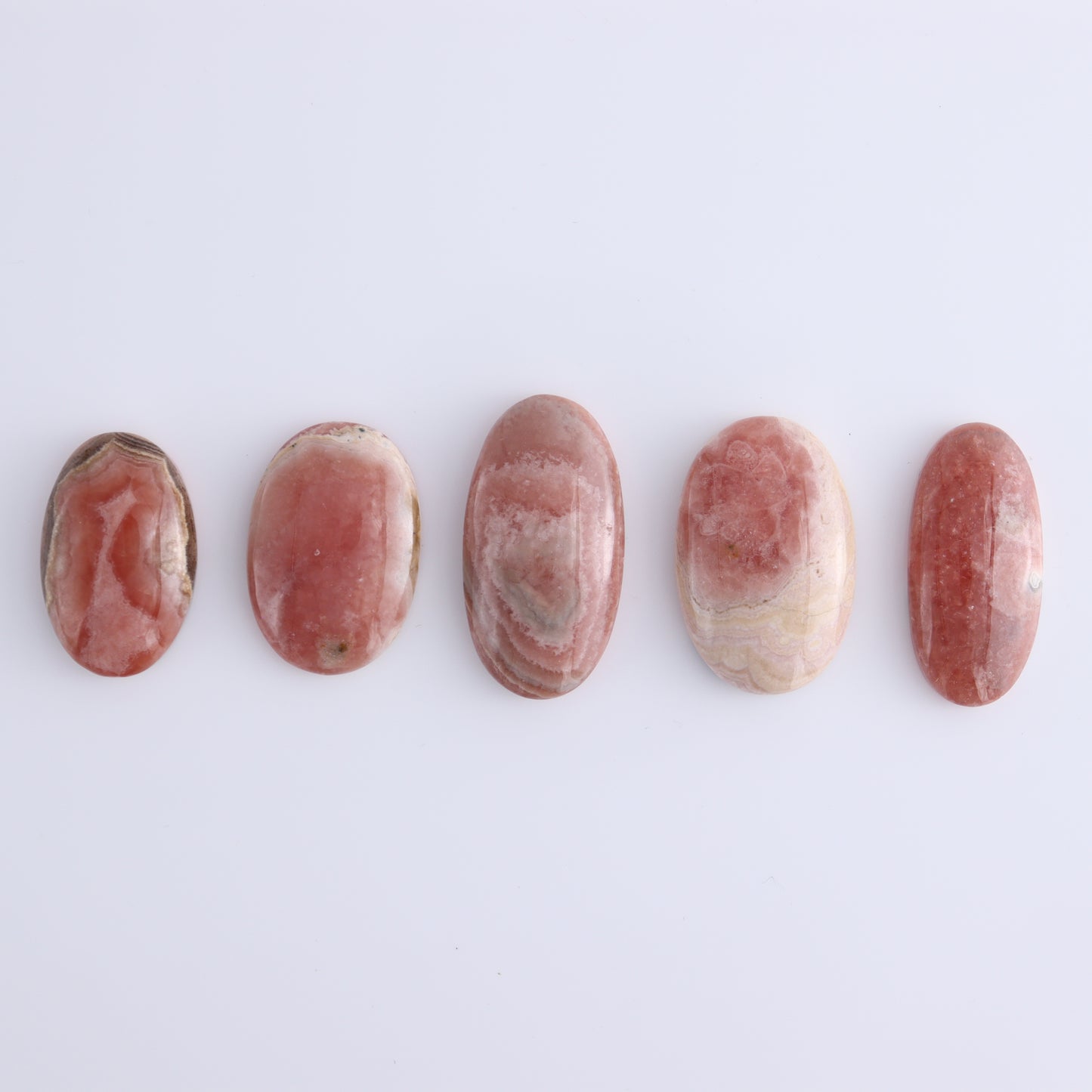 Rhodochrosite Oval Cabs Set of 8 - Expert Wholesale and Supplier of Wholesale Crystals & Bulk Gemstones, ["Argentina","Cabs","Oval","Rhodochrosite"]