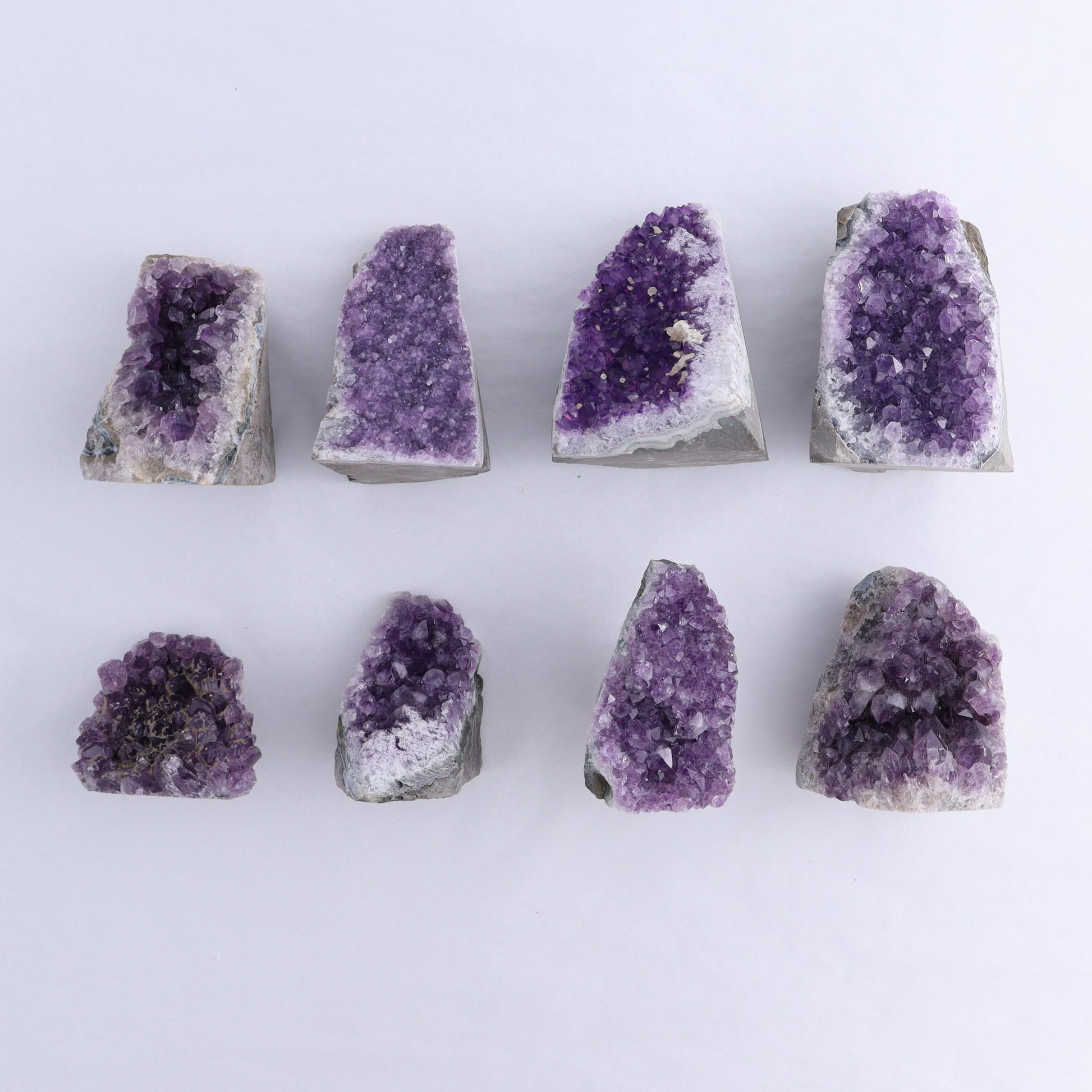 Uruguay Amethyst Cut Base Set of 8 - Expert Wholesale and Supplier of Wholesale Crystals & Bulk Gemstones, ["Amethyst","Cut Base","Uruguay"]