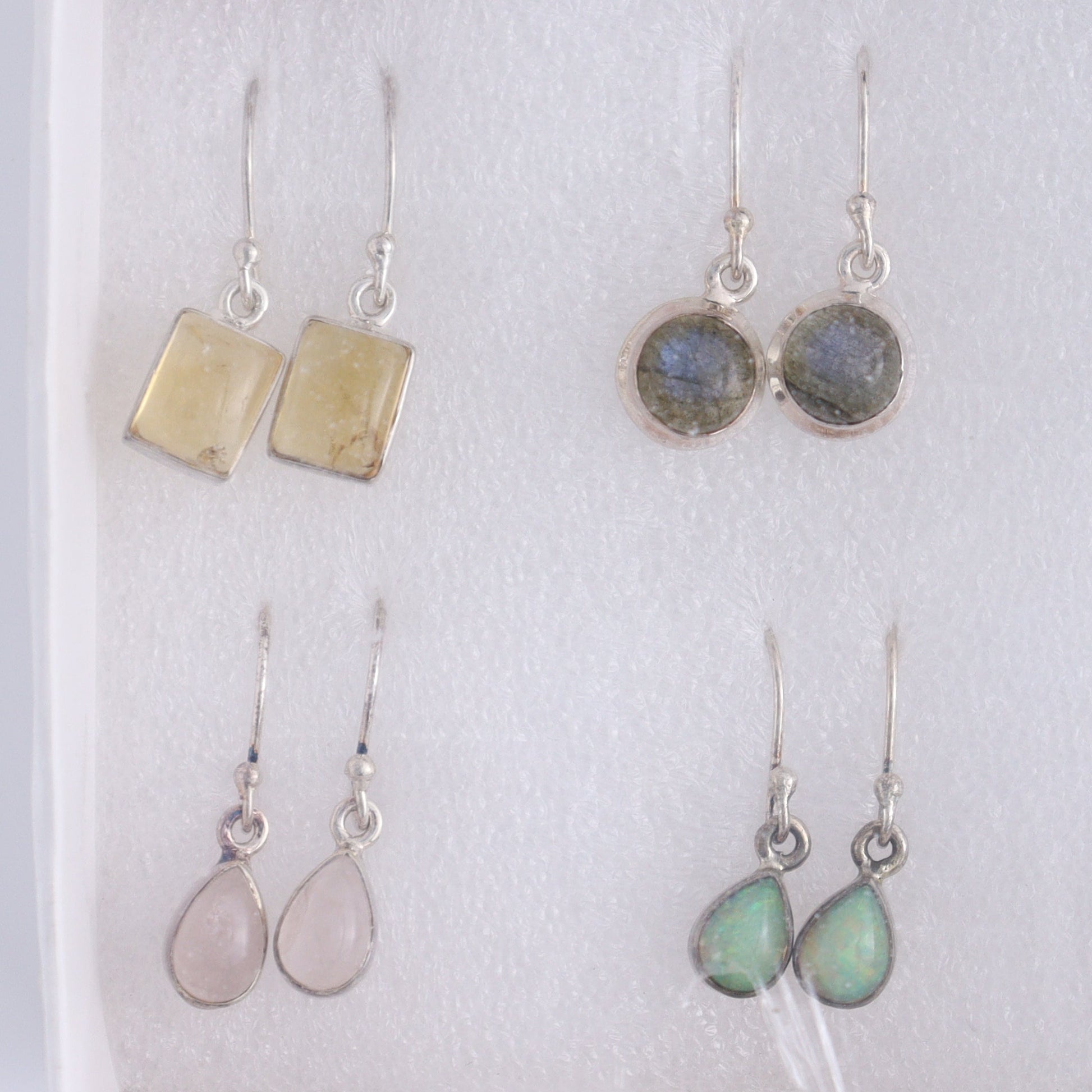 Mixed Gemstones Earrings Set of 9 - Expert Wholesale and Supplier of Wholesale Crystals & Bulk Gemstones, ["Amethyst","Citrine","close_50","earrings","ethiopian opal","Golden Rutile","India","Kyanite","Labradorite","Rainbow Moonstone","Rose Quartz","sterling silver"]
