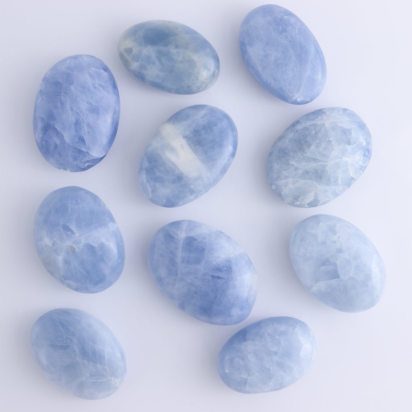 Blue Calcite Palm Stones 1 kg Set - Expert Wholesale and Supplier of Wholesale Crystals & Bulk Gemstones, ["Blue Calcite","Calcite","Madagascar","Palm Stones"]