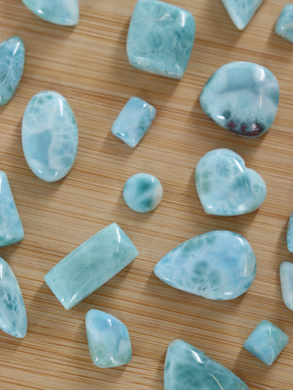Larimar Cabs Set of 29 - Expert Wholesale and Supplier of Wholesale Crystals & Bulk Gemstones, ["Cabs","Larimar","Mixed Carvings"]