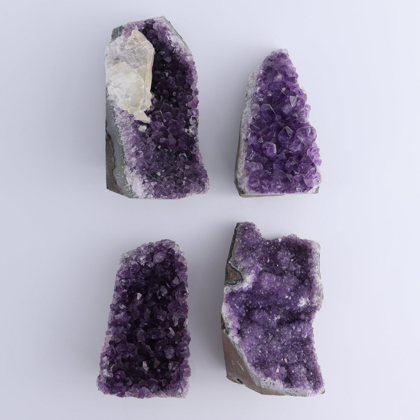 Uruguay Amethyst Cut Base Set of 4 - Expert Wholesale and Supplier of Wholesale Crystals & Bulk Gemstones, ["Amethyst","Cut Base","Uruguay"]