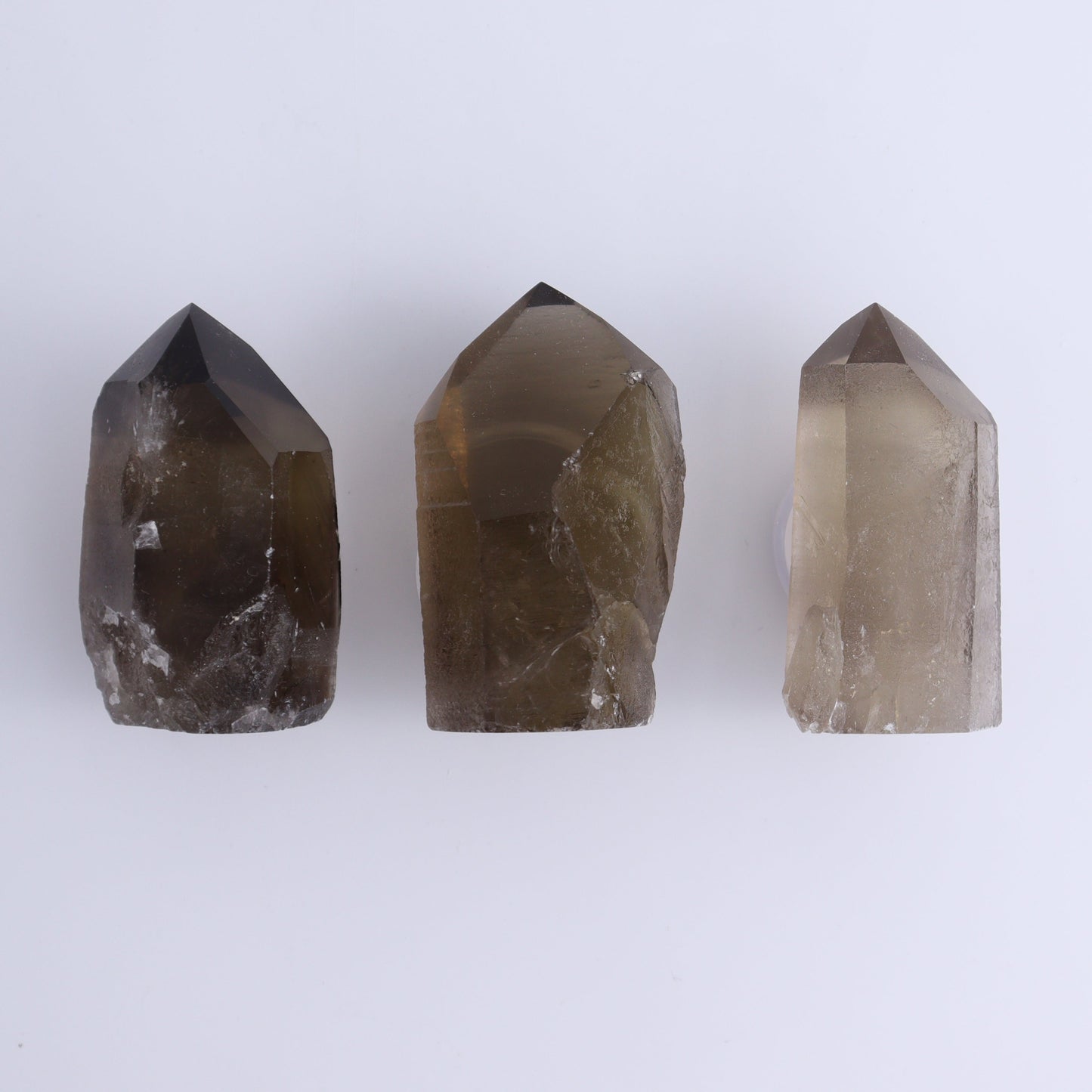 Smoky Quartz Polished Tops Set of 35 - Expert Wholesale and Supplier of Wholesale Crystals & Bulk Gemstones, ["Brazil","close_70","Points","Quartz","Smoky Quartz"]