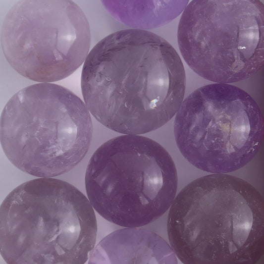 Clear Amethyst Spheres 10 Piece Set - Expert Wholesale and Supplier of Wholesale Crystals & Bulk Gemstones, ["Amethyst","Clear Quartz","Spheres"]