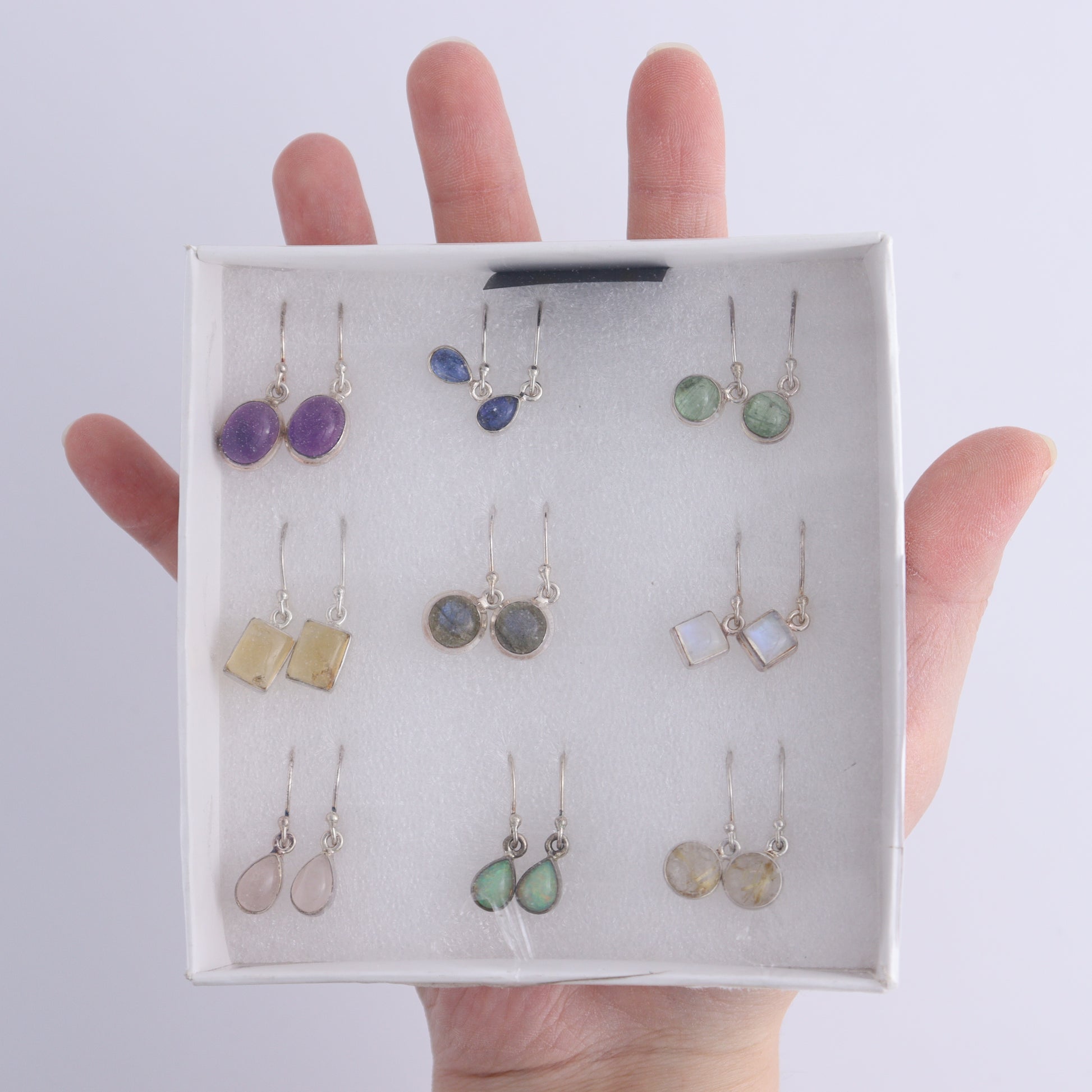 Mixed Gemstones Earrings Set of 9 - Expert Wholesale and Supplier of Wholesale Crystals & Bulk Gemstones, ["Amethyst","Citrine","close_50","earrings","ethiopian opal","Golden Rutile","India","Kyanite","Labradorite","Rainbow Moonstone","Rose Quartz","sterling silver"]