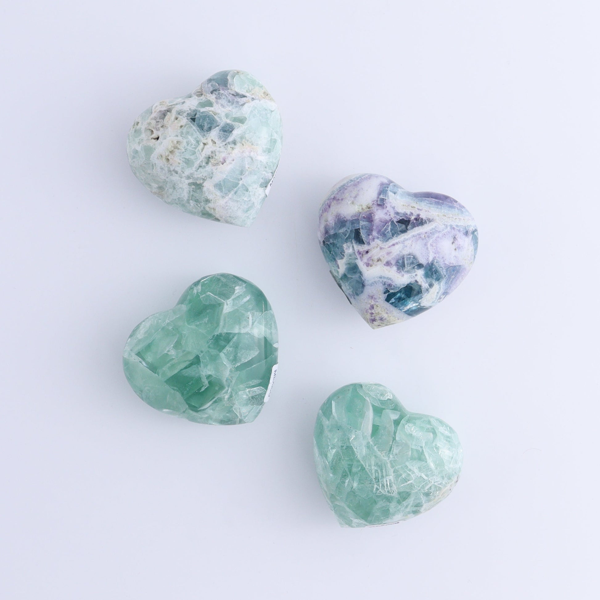 Fluorite Hearts Set of 7 - Expert Wholesale and Supplier of Wholesale Crystals & Bulk Gemstones, ["Fluorite","Hearts","Mexico"]