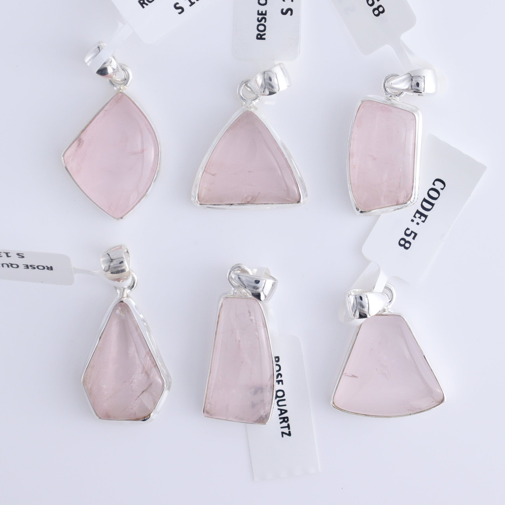 One Rose Quartz Sterling Silver Pendant (chain not included) - Expert Wholesale and Supplier of Wholesale Crystals & Bulk Gemstones, ["Pendant","Rose Quartz","Sterling Silver"]