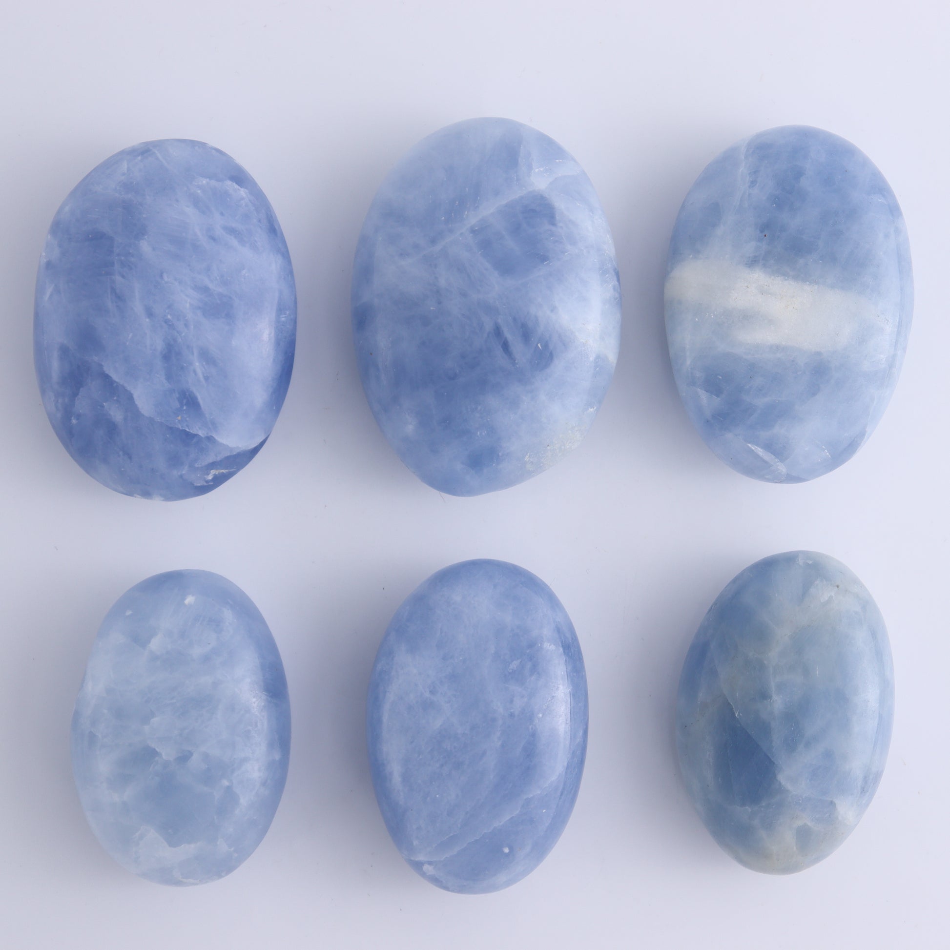 Blue Calcite Palm Stones 1 kg Set - Expert Wholesale and Supplier of Wholesale Crystals & Bulk Gemstones, ["Blue Calcite","Calcite","Madagascar","Palm Stones"]