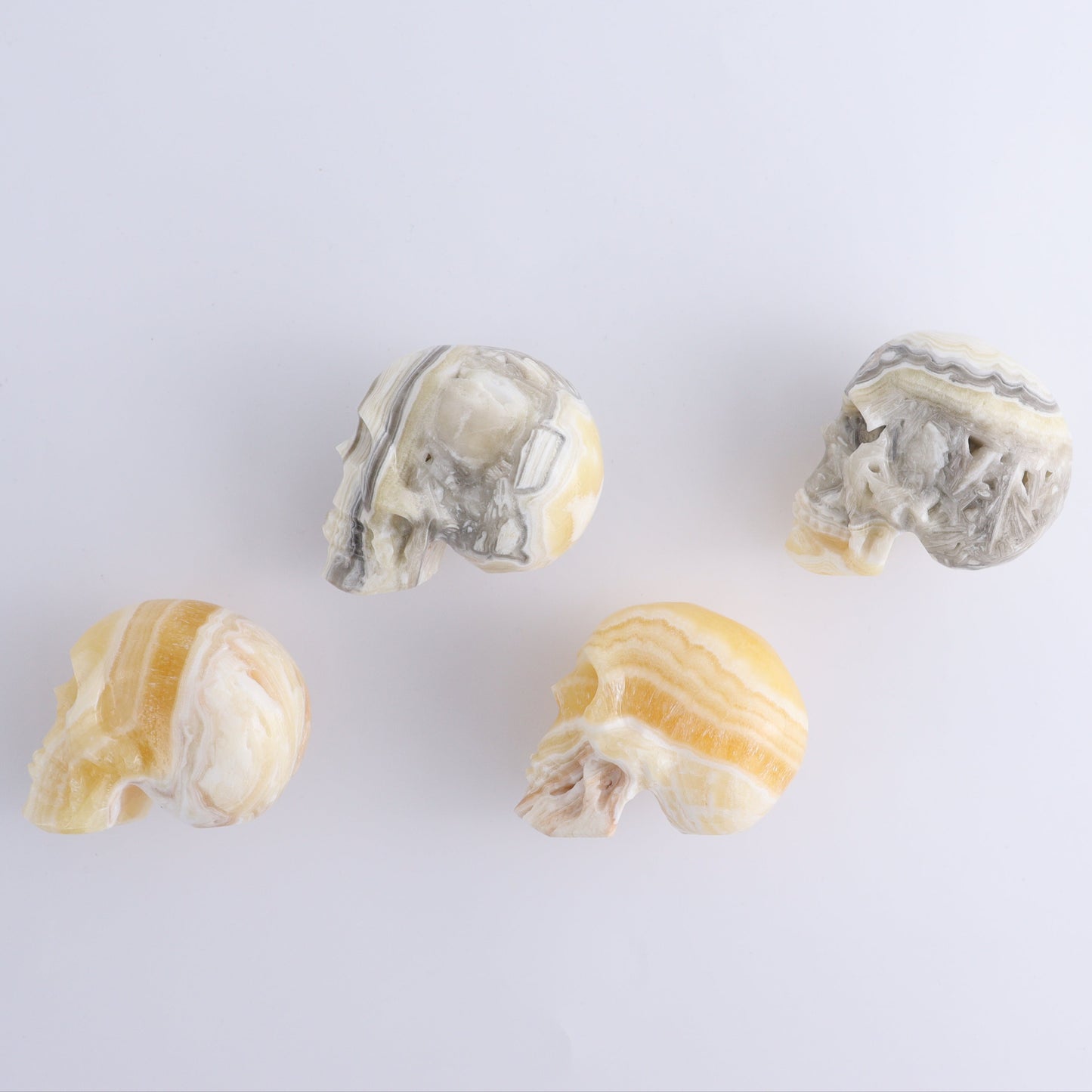 Onyx Skulls Set of 4 - Expert Wholesale and Supplier of Wholesale Crystals & Bulk Gemstones, ["Mexico","onyx","Skulls"]