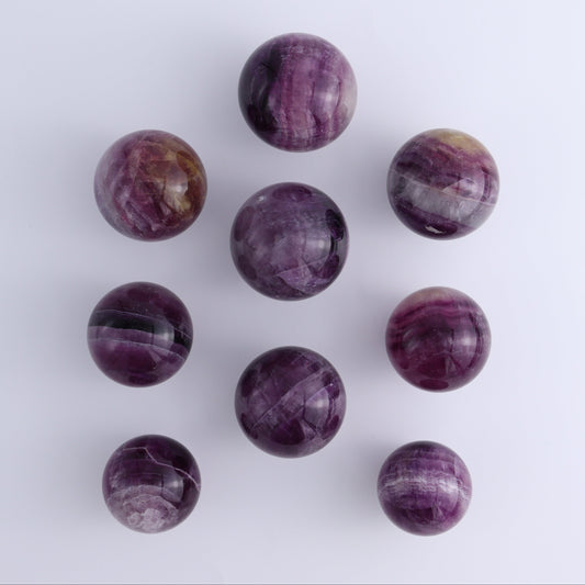 Purple Fluorite Spheres Set of 9 - Expert Wholesale and Supplier of Wholesale Crystals & Bulk Gemstones, ["Fluorite","Purple Fluorite","Spheres"]